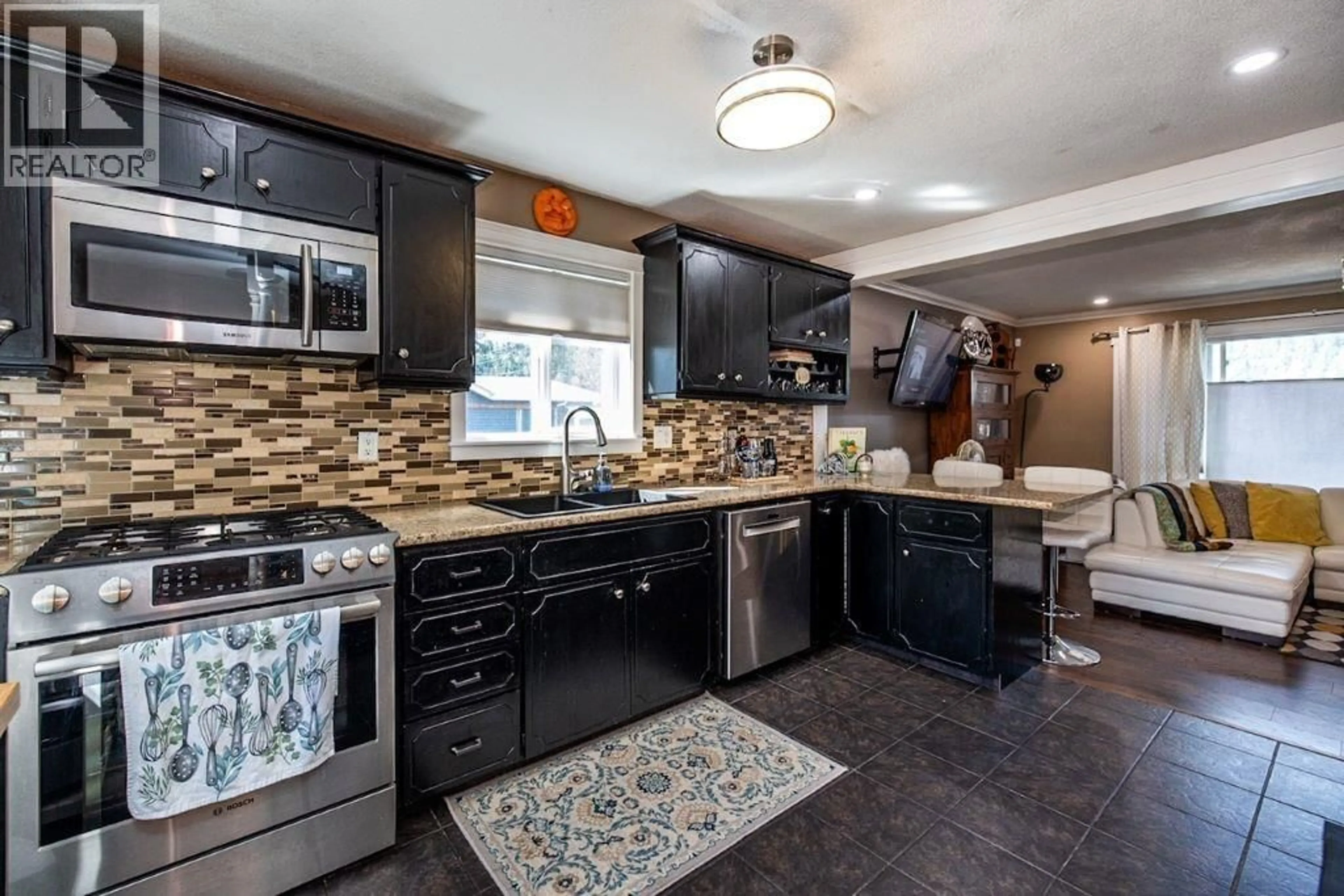 Contemporary kitchen, ceramic/tile floor for 2364 NORTHWOOD PULPMILL ROAD, Prince George British Columbia V2K1K2