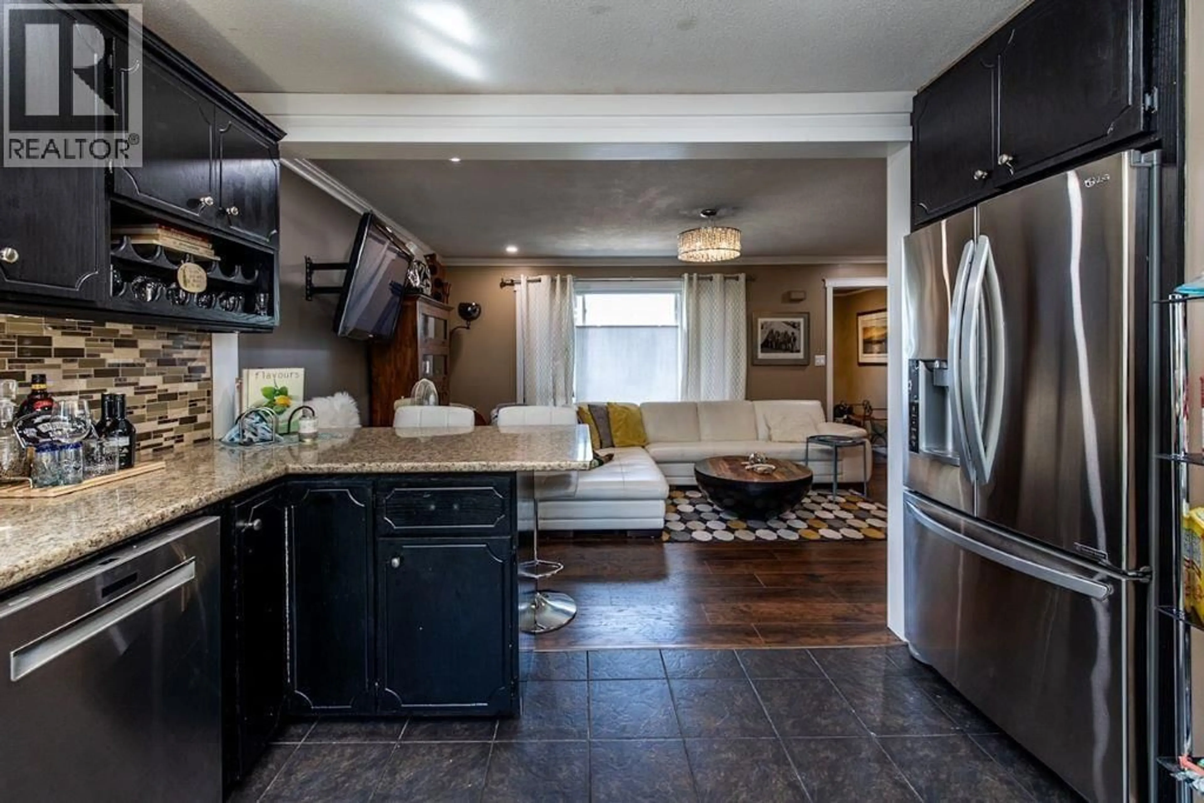 Open concept kitchen, ceramic/tile floor for 2364 NORTHWOOD PULPMILL ROAD, Prince George British Columbia V2K1K2