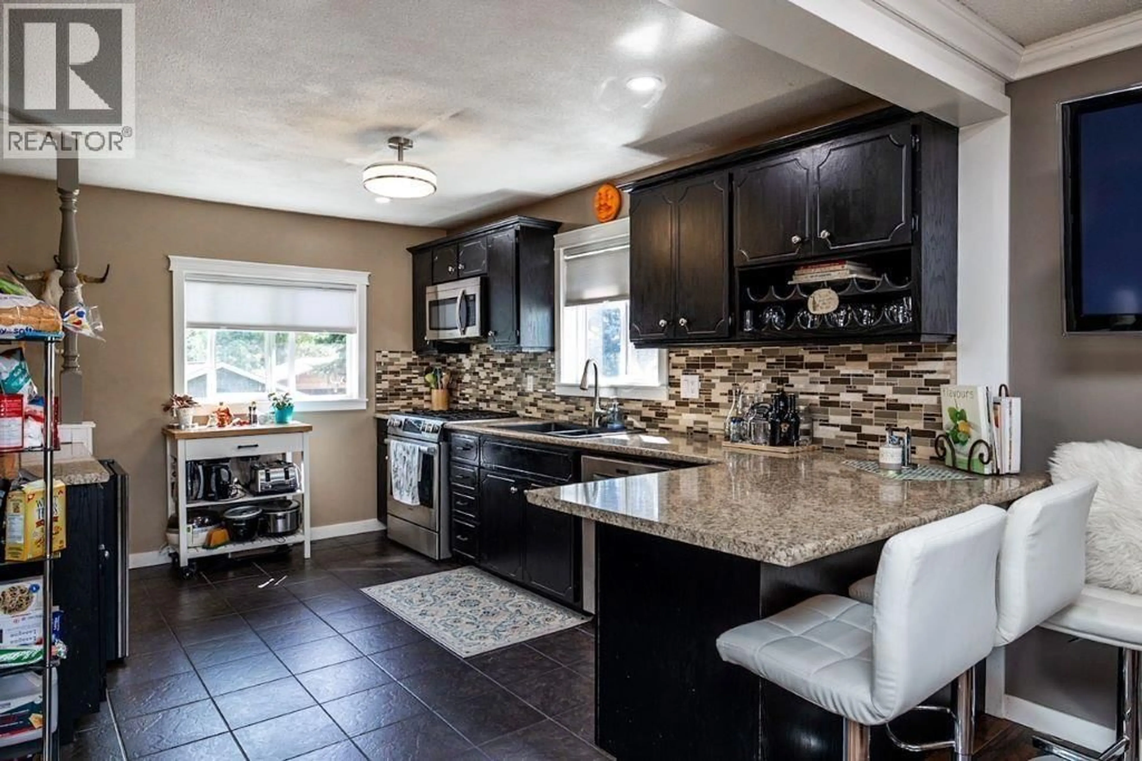 Open concept kitchen, ceramic/tile floor for 2364 NORTHWOOD PULPMILL ROAD, Prince George British Columbia V2K1K2