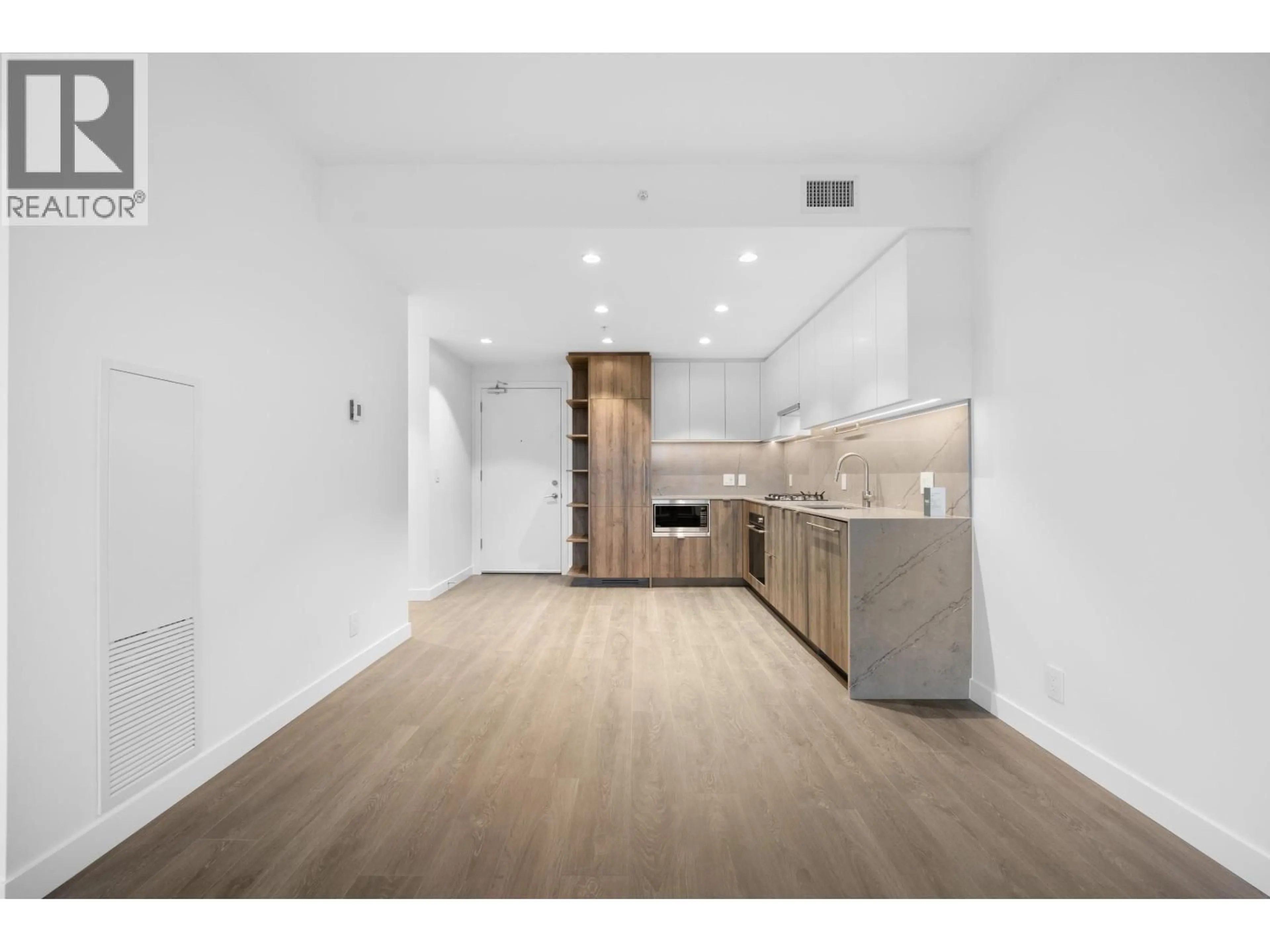 Open concept kitchen, wood/laminate floor for 407 - 505 NELSON STREET, Coquitlam British Columbia V3J0R5