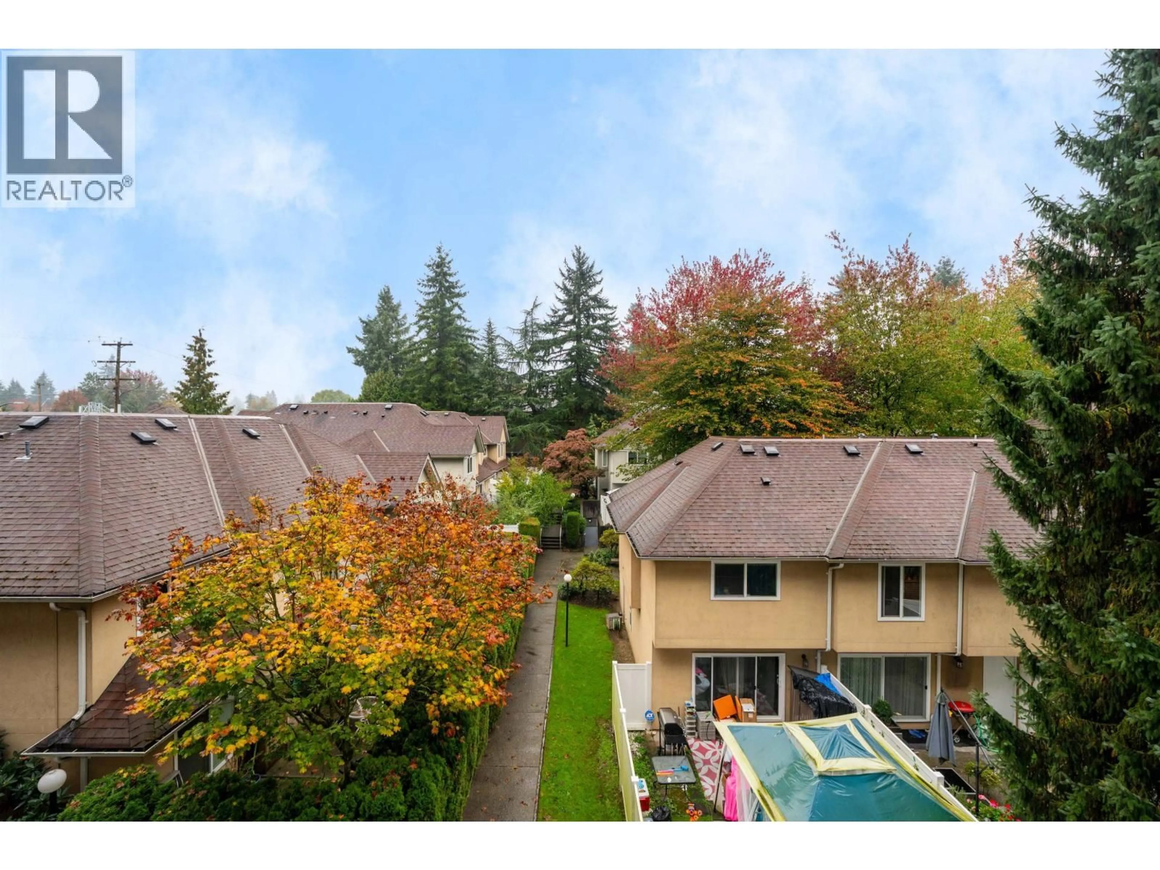 A pic from outside/outdoor area/front of a property/back of a property/a pic from drone, water/lake/river/ocean view for 310 - 741 ANSKAR COURT, Coquitlam British Columbia V3J0N3