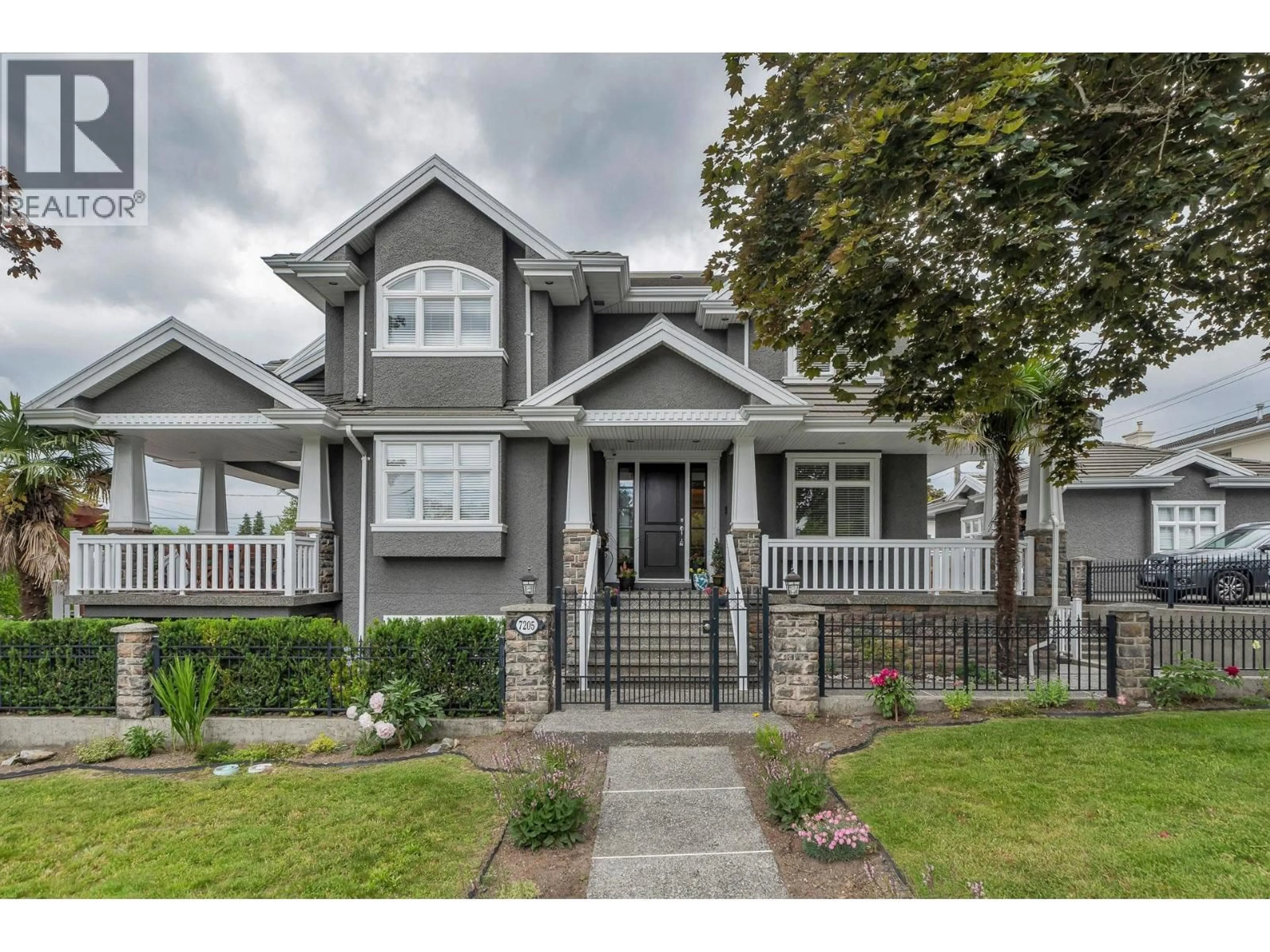 Home with vinyl exterior material, street for 7205 UNION STREET, Burnaby British Columbia V5A1J1