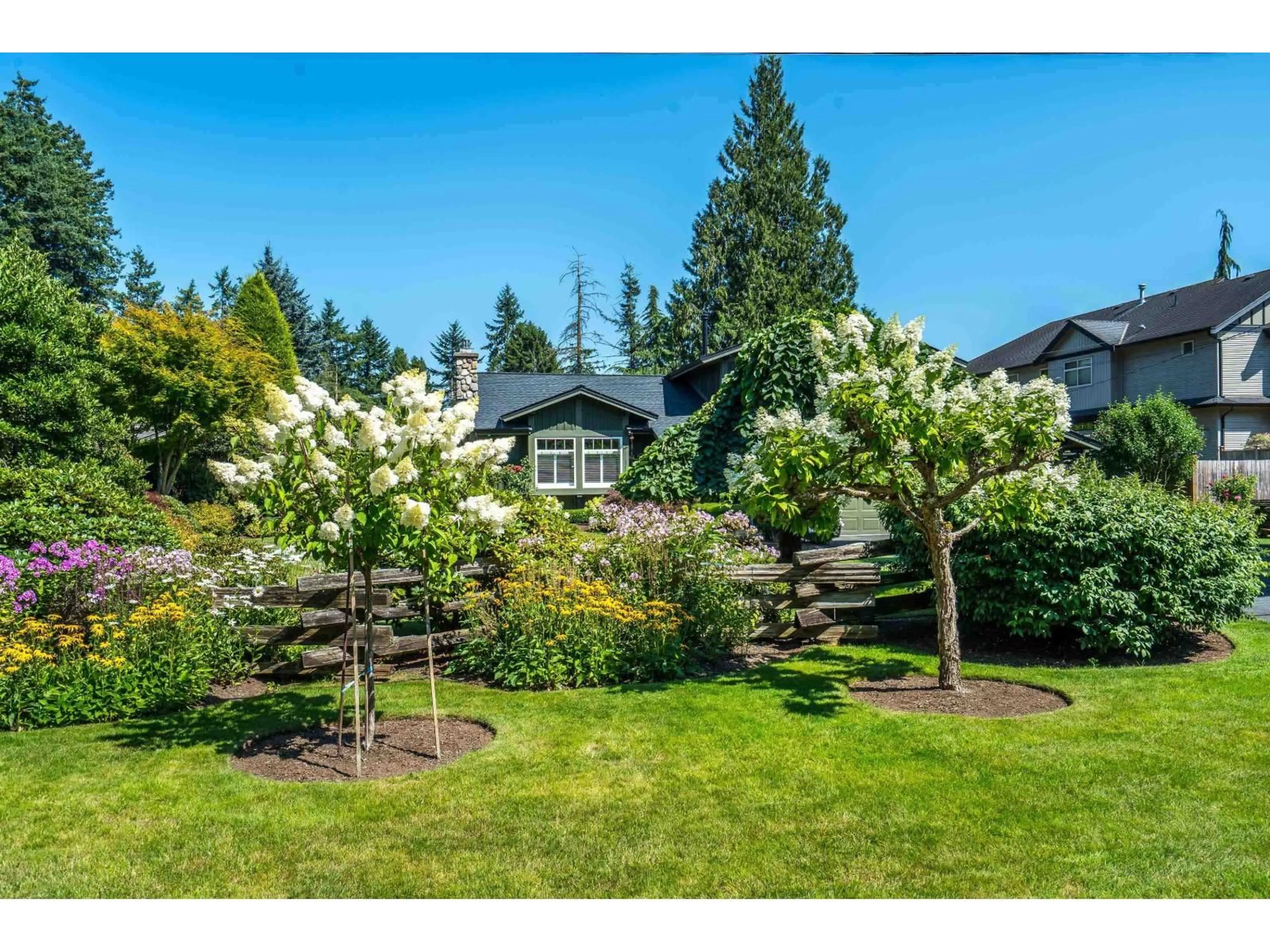 A pic from outside/outdoor area/front of a property/back of a property/a pic from drone, unknown for 4226 199A, Langley British Columbia V3A4V6