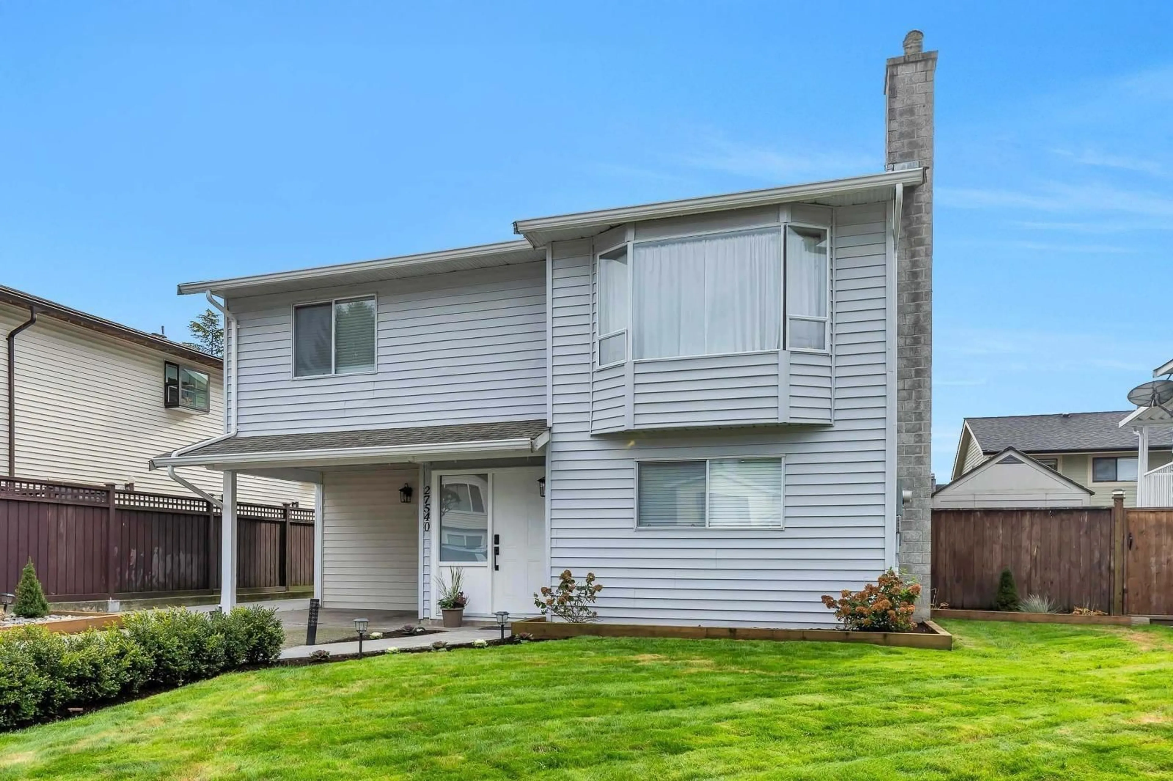 Home with vinyl exterior material, street for 27540 31B, Langley British Columbia V4W3L3