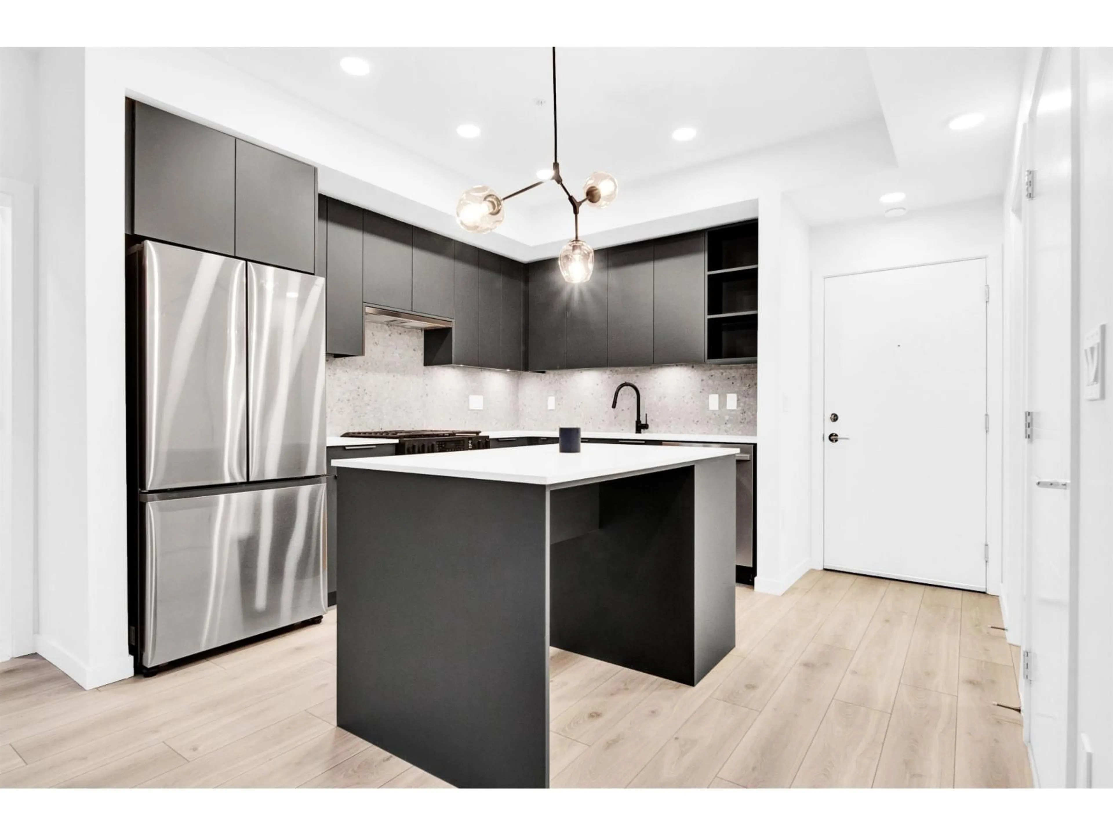Contemporary kitchen, wood/laminate floor for 109 - 7936 206, Langley British Columbia V2Y1X6