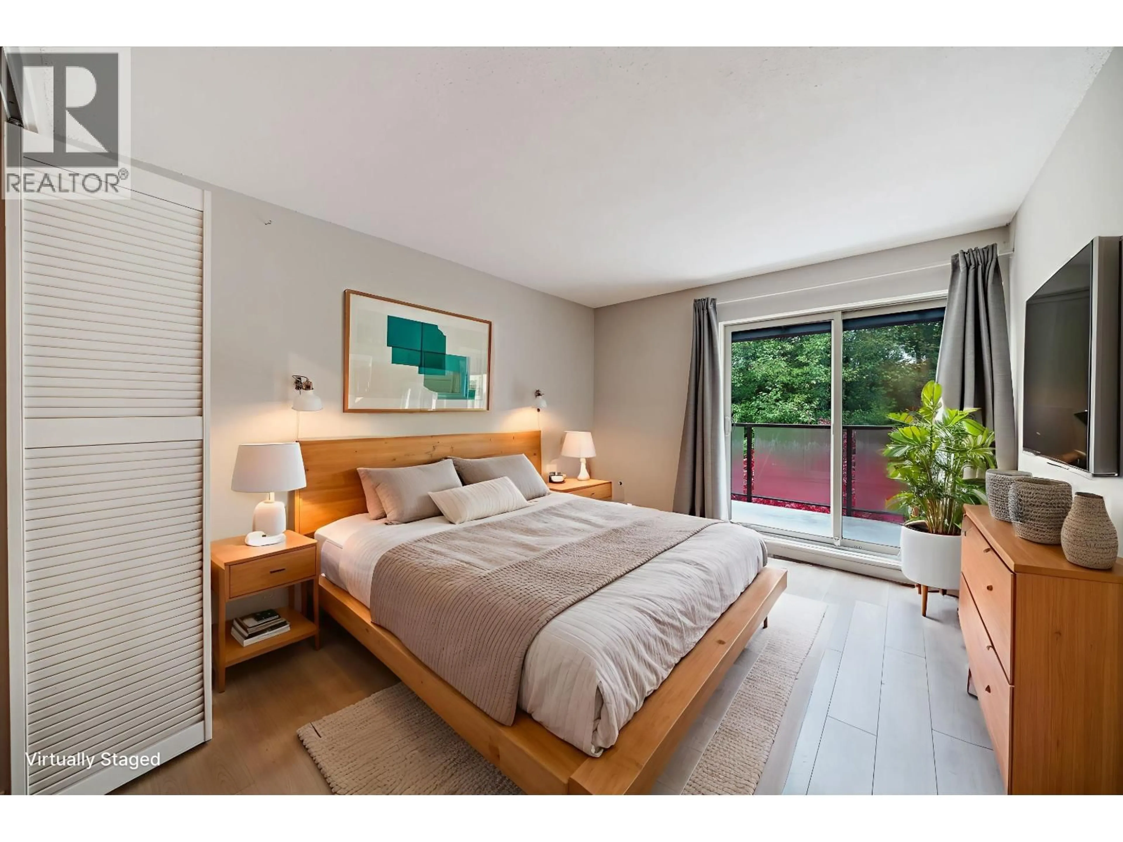 Bedroom with bed, wood/laminate floor for 408 - 4373 HALIFAX STREET, Burnaby British Columbia V5C5Z2