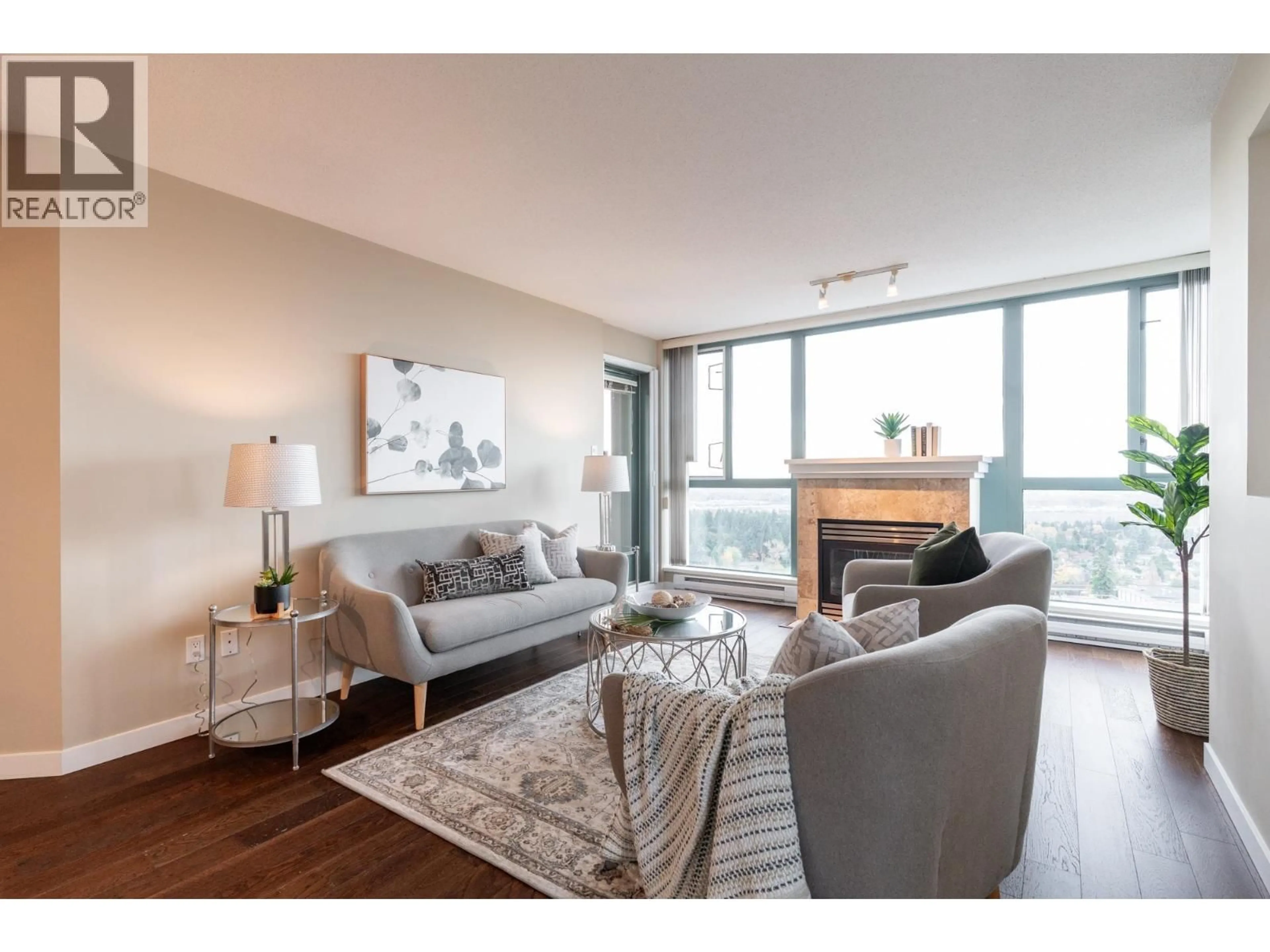 Living room with furniture, wood/laminate floor for 1704 - 6659 SOUTHOAKS CRESCENT, Burnaby British Columbia V5E4M9