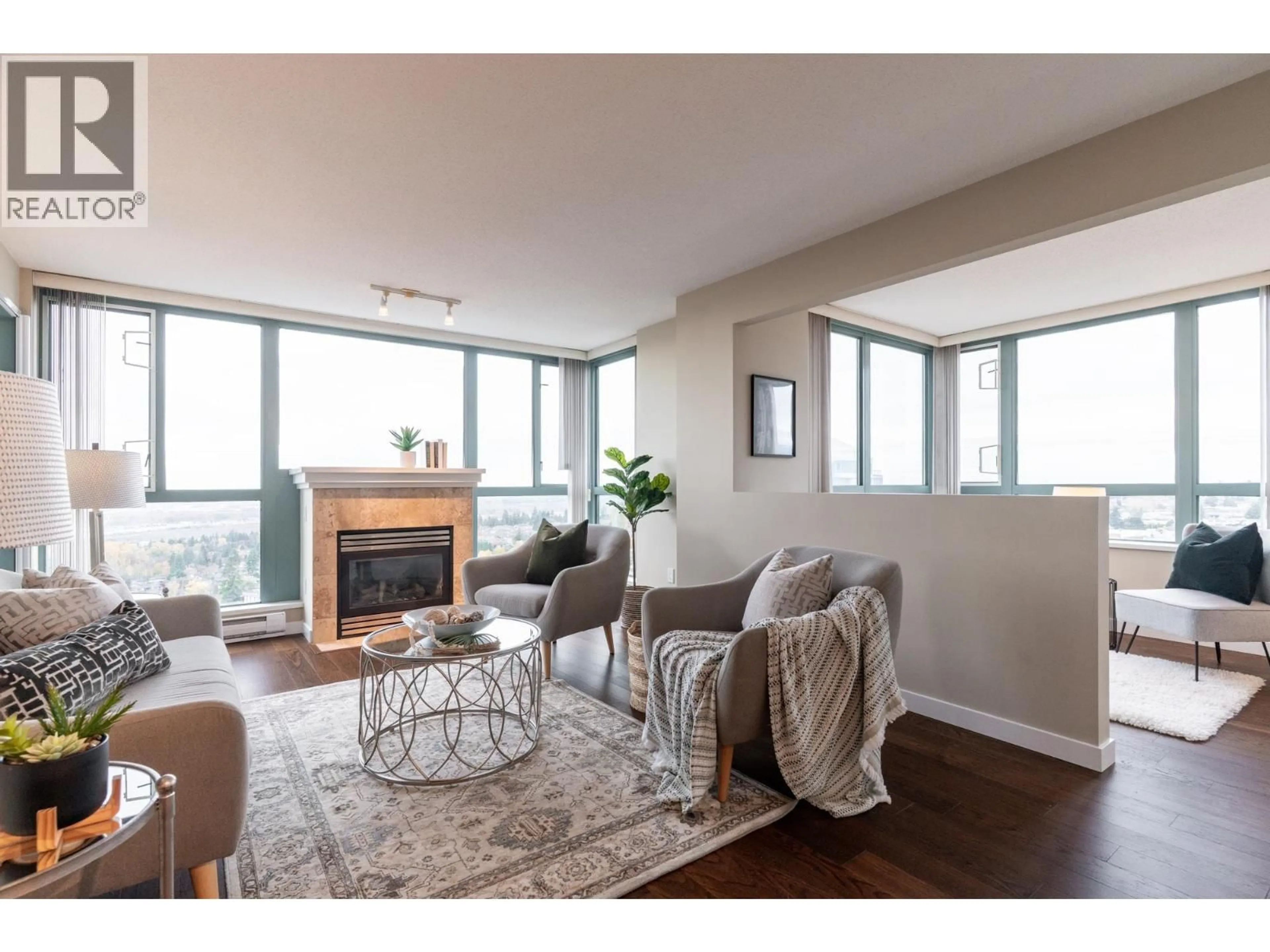 Living room with furniture, wood/laminate floor for 1704 - 6659 SOUTHOAKS CRESCENT, Burnaby British Columbia V5E4M9