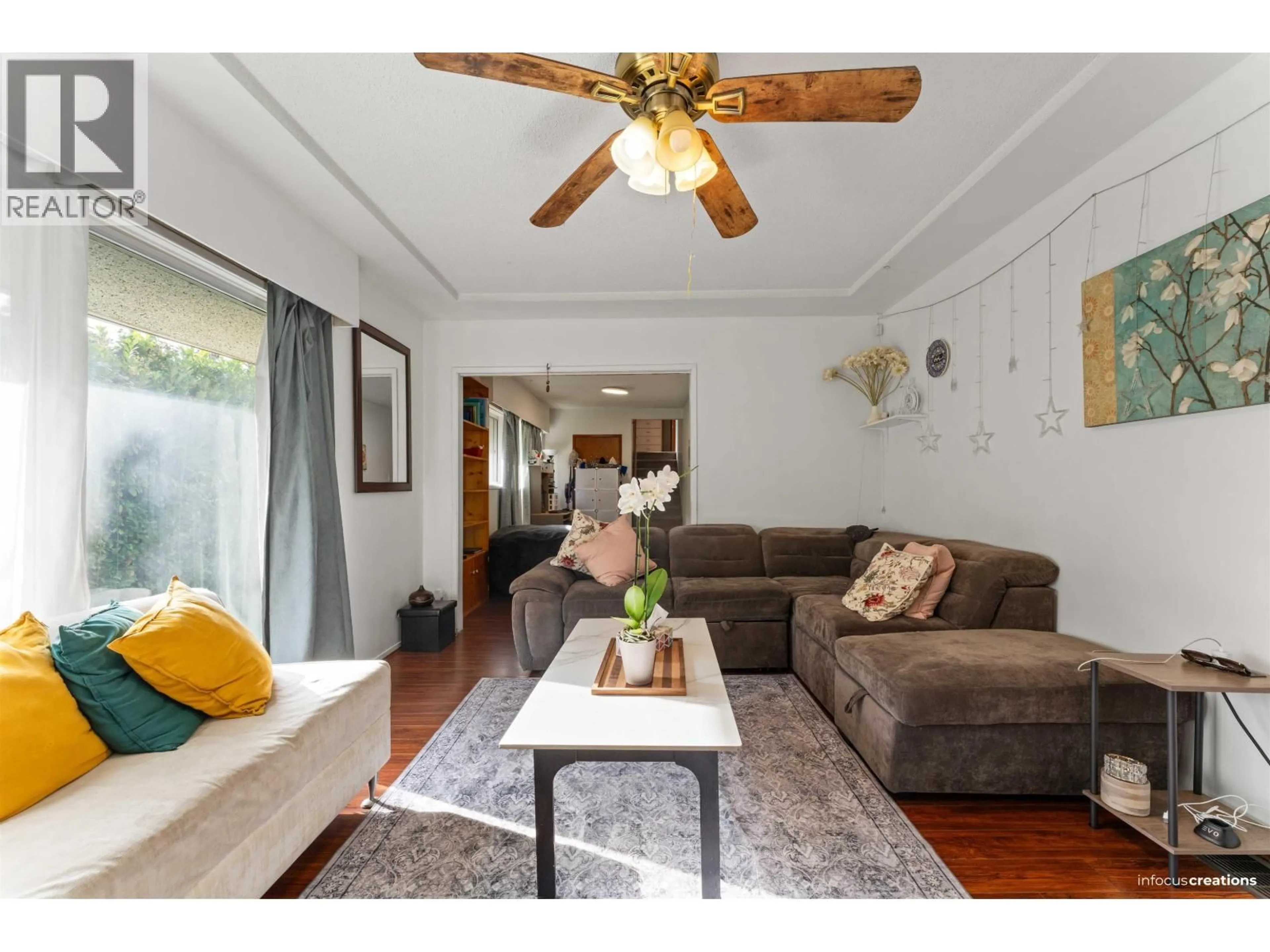 Living room with furniture, wood/laminate floor for 23311 WESTMINSTER HIGHWAY, Richmond British Columbia V6V1C1