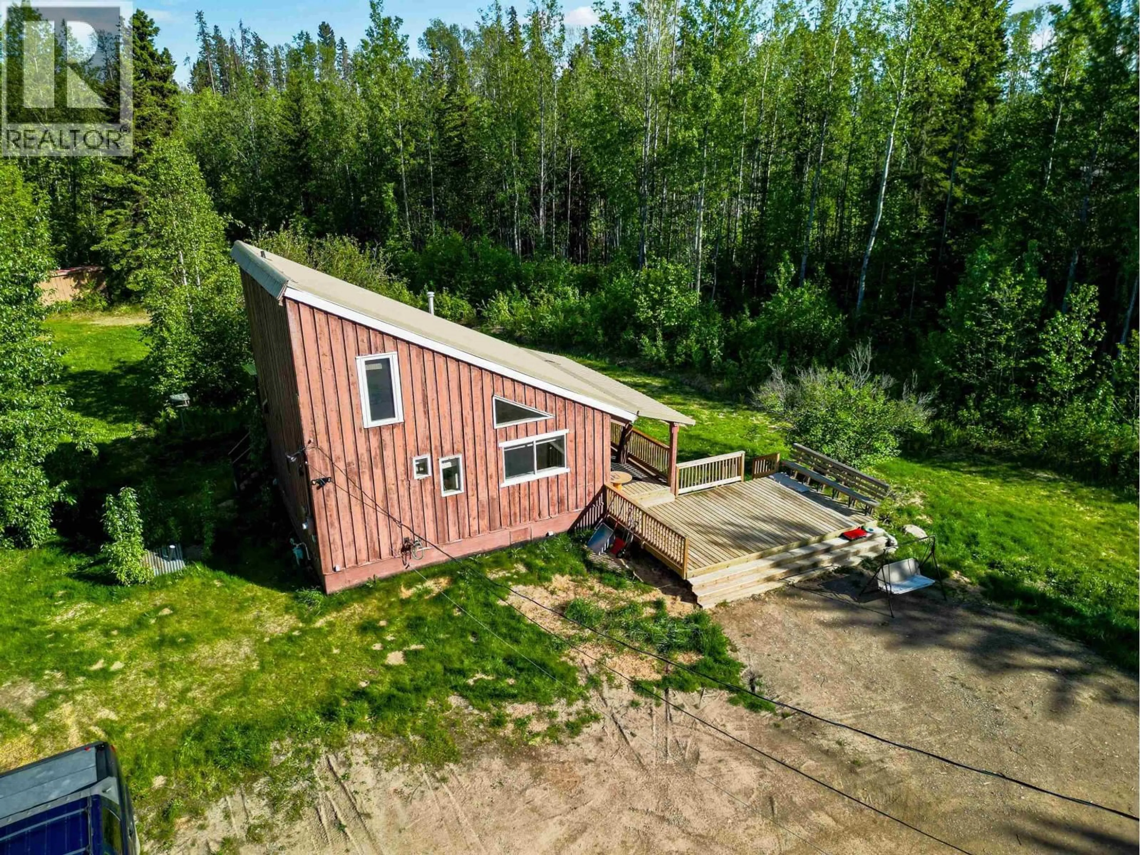 A pic from outside/outdoor area/front of a property/back of a property/a pic from drone, building for 72 PIONEER WAY, Fort Nelson British Columbia V0C1R0