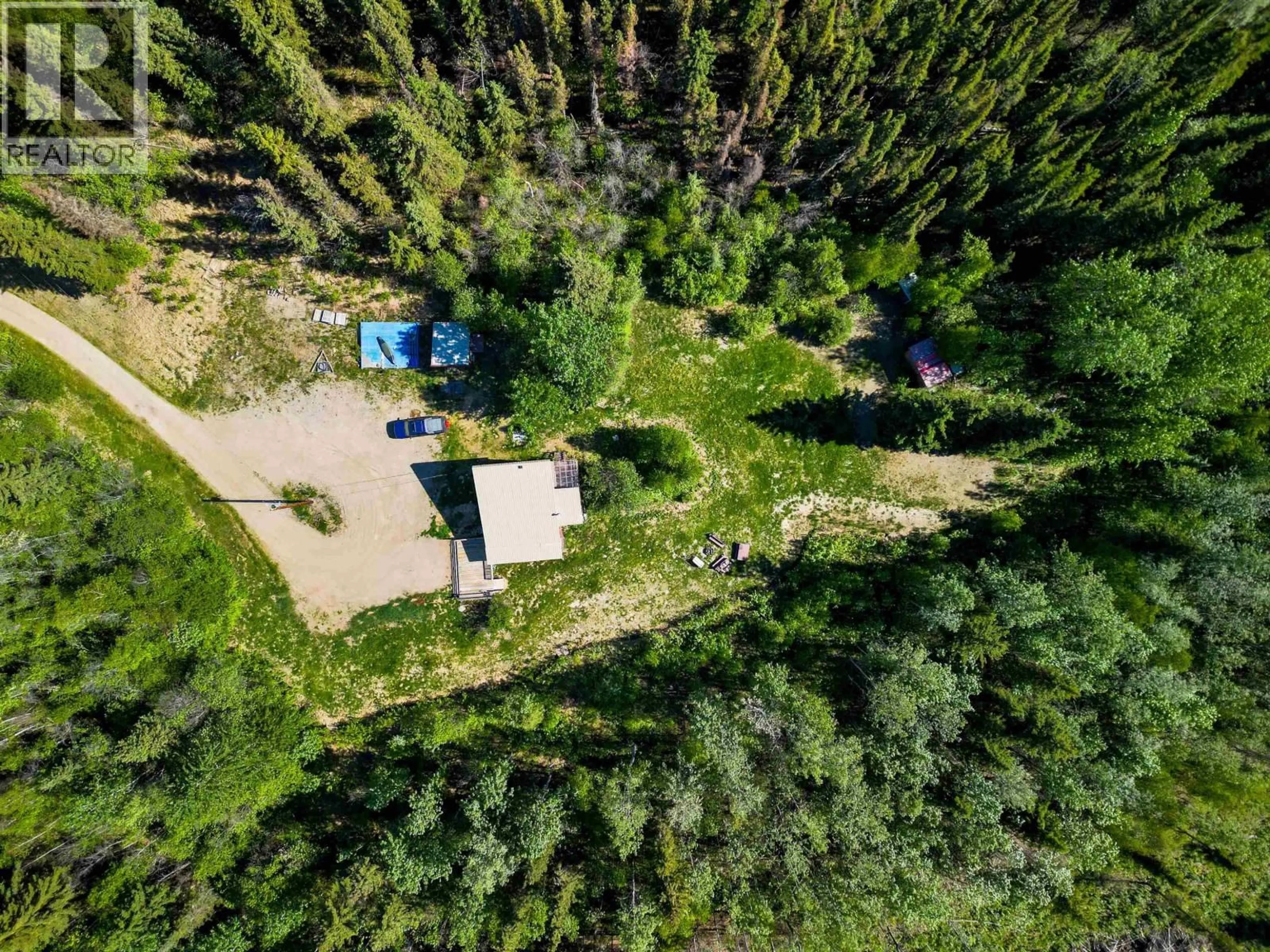 A pic from outside/outdoor area/front of a property/back of a property/a pic from drone, forest/trees view for 72 PIONEER WAY, Fort Nelson British Columbia V0C1R0