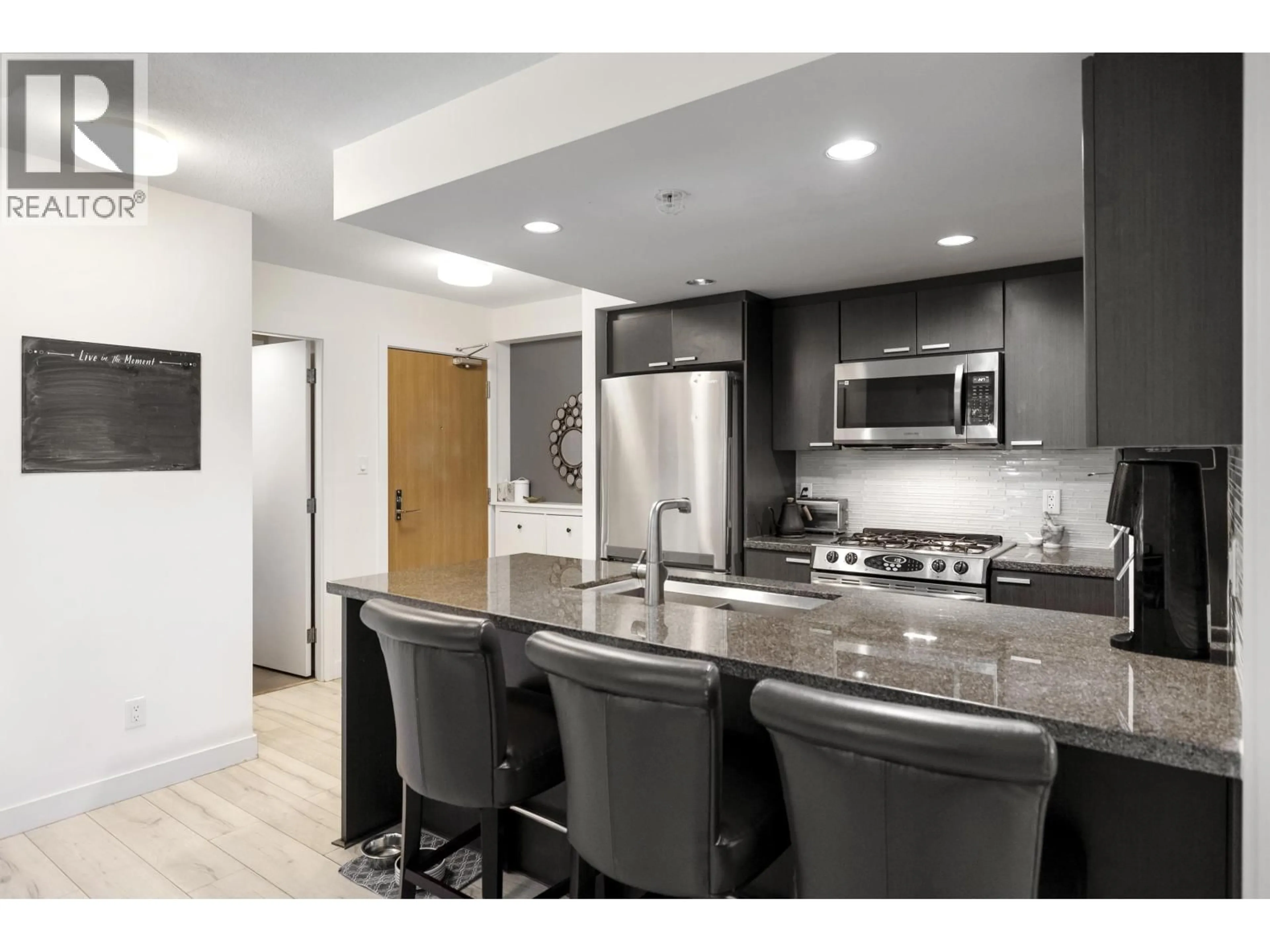 Open concept kitchen, ceramic/tile floor for 302 - 2200 DOUGLAS ROAD, Burnaby British Columbia V5C0G8