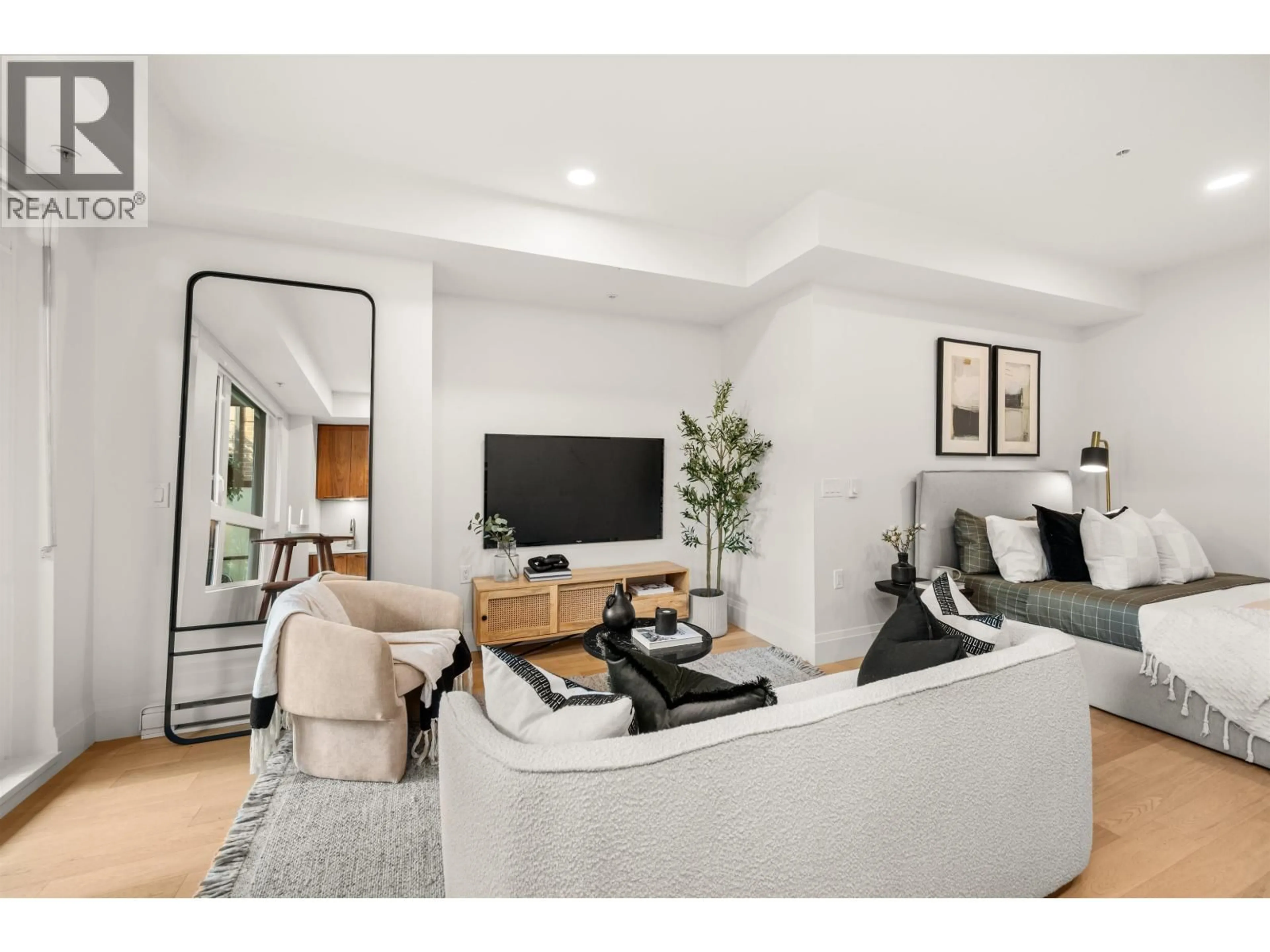 Living room with furniture, unknown for 106 - 2550 GARDEN DRIVE, Vancouver British Columbia V5N4X6