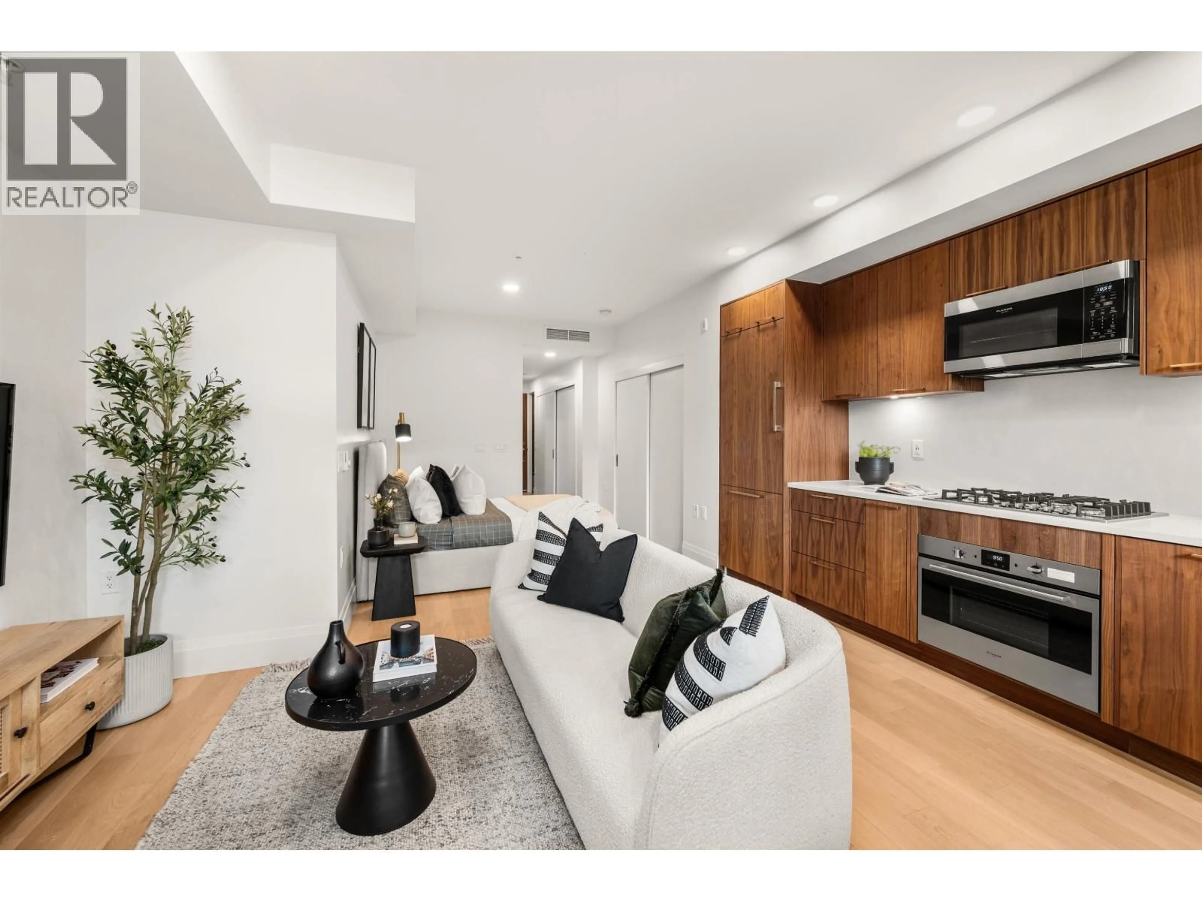 Living room with furniture, unknown for 106 - 2550 GARDEN DRIVE, Vancouver British Columbia V5N4X6