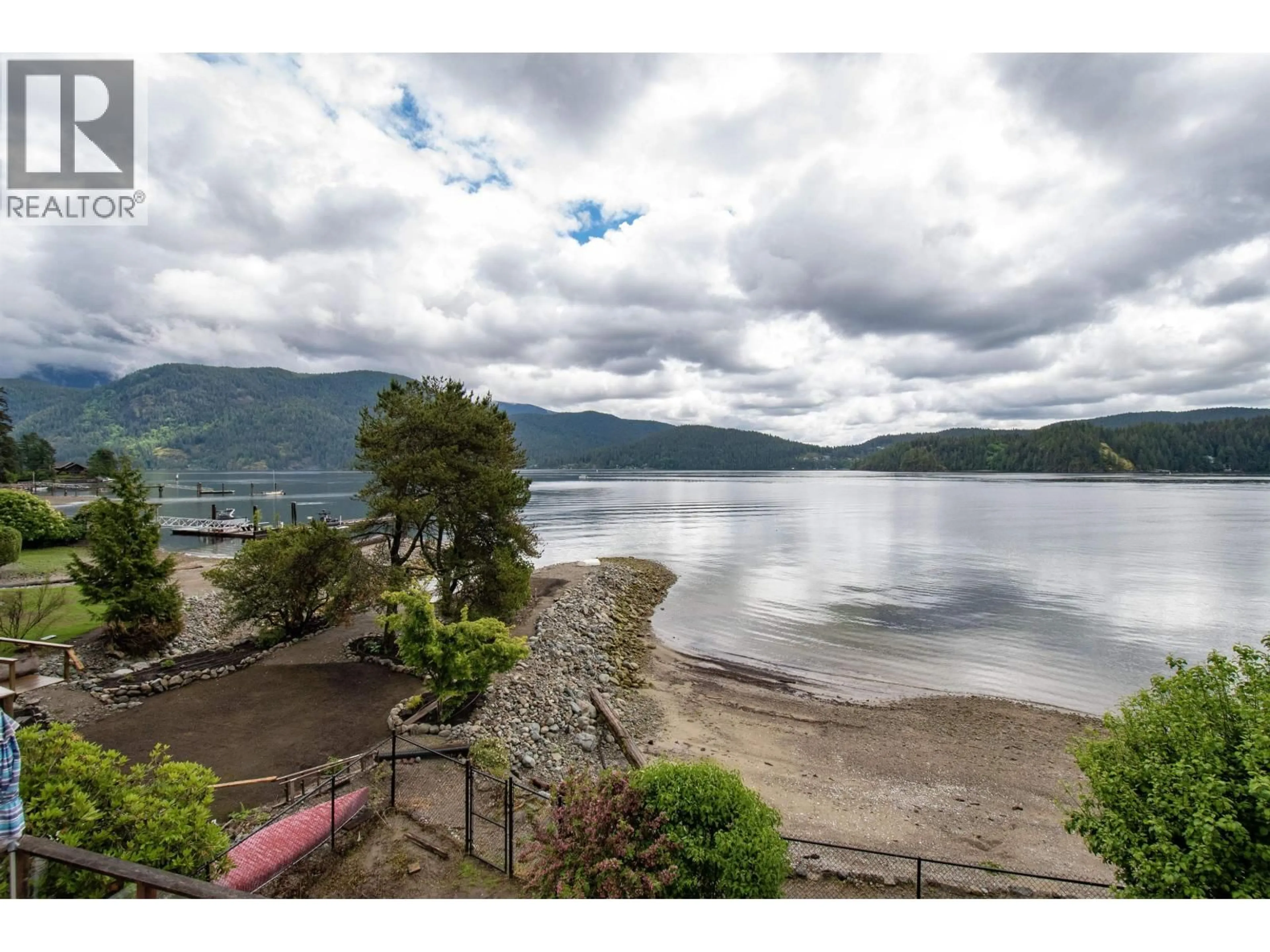 A pic from outside/outdoor area/front of a property/back of a property/a pic from drone, water/lake/river/ocean view for 5293 INDIAN RIVER DRIVE, North Vancouver British Columbia V7G2T6