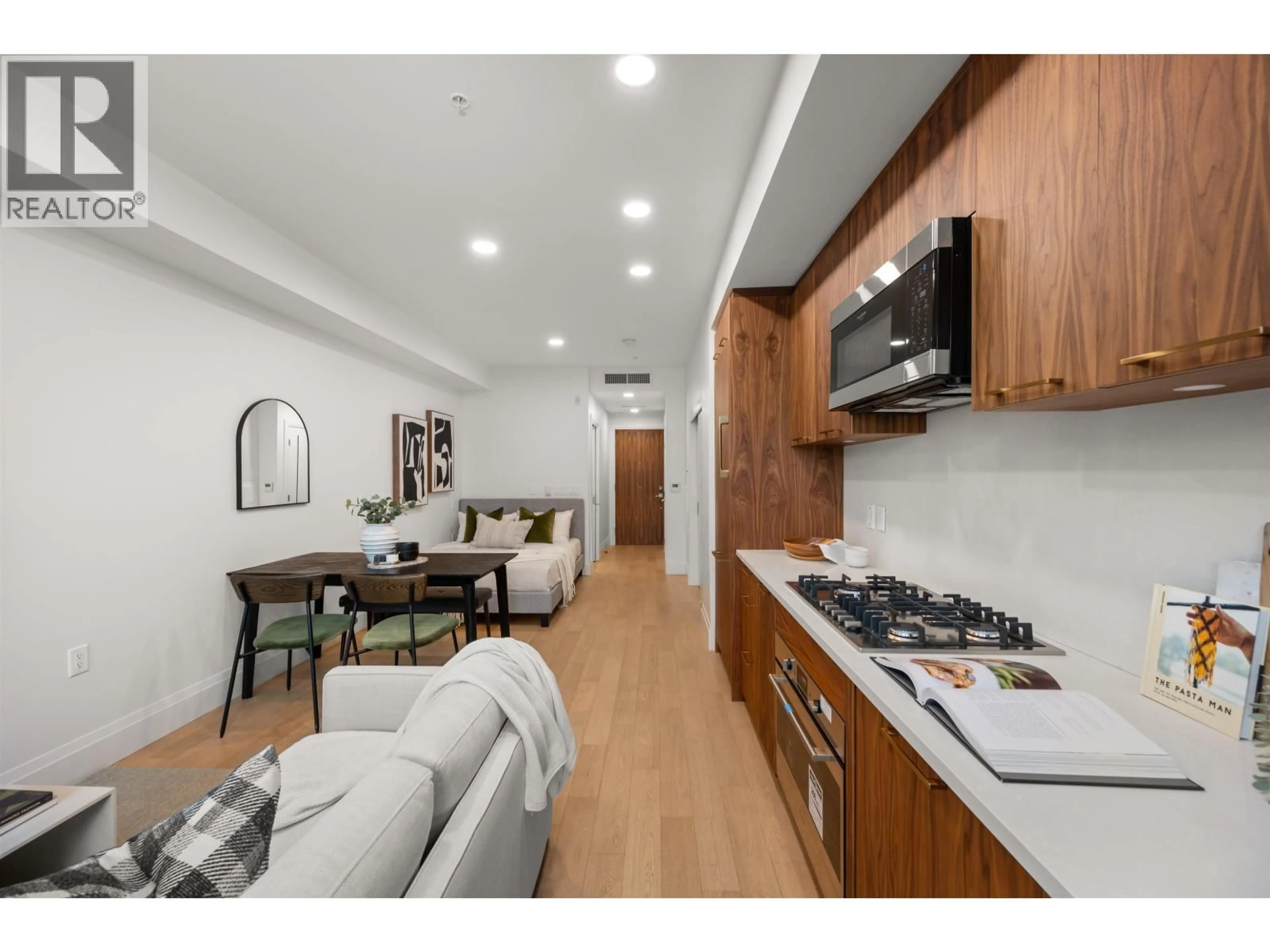 Open concept kitchen, unknown for 111 - 2550 GARDEN DRIVE, Vancouver British Columbia V5N4X6