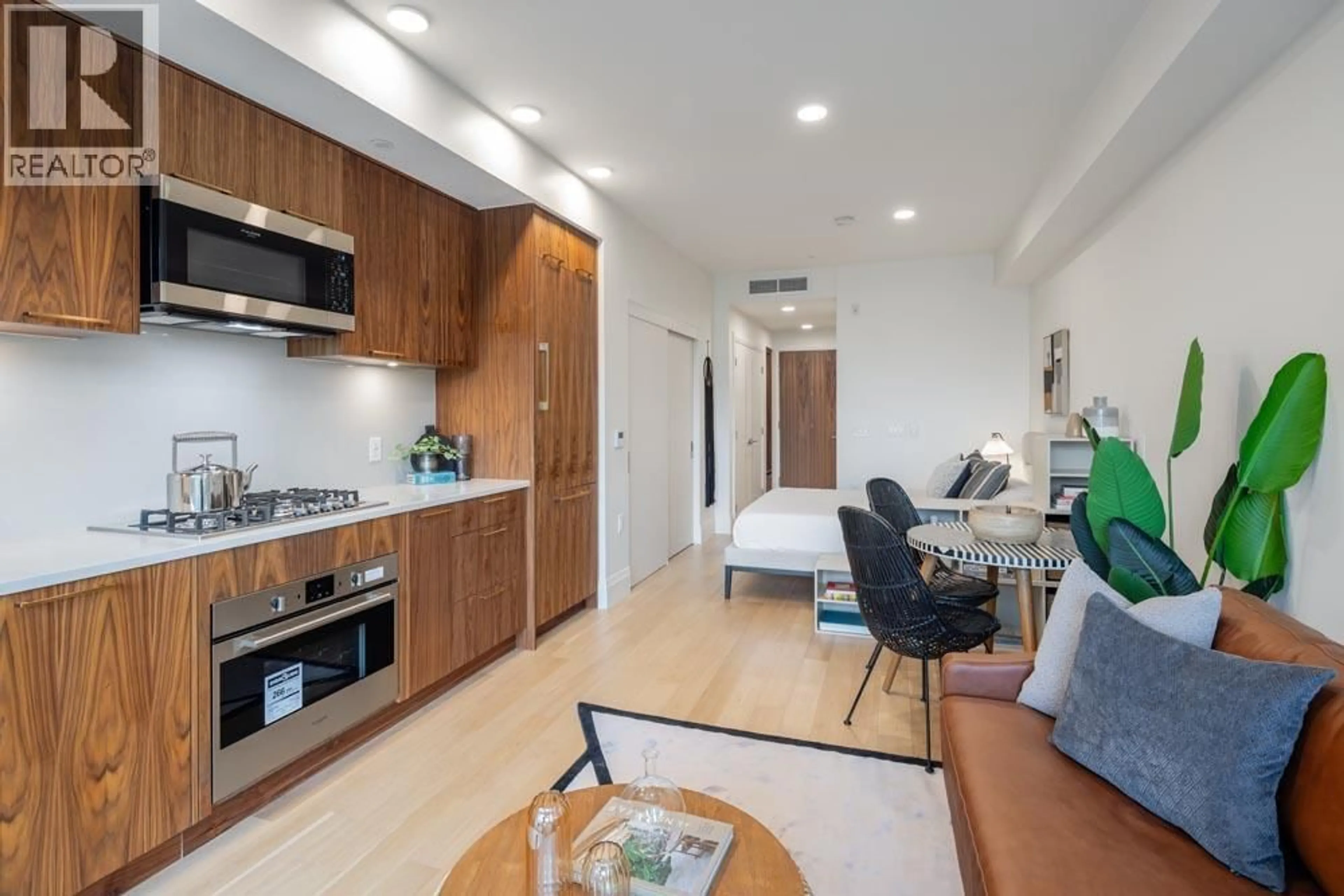 Open concept kitchen, unknown for 410 - 2550 GARDEN DRIVE, Vancouver British Columbia V5N4X6