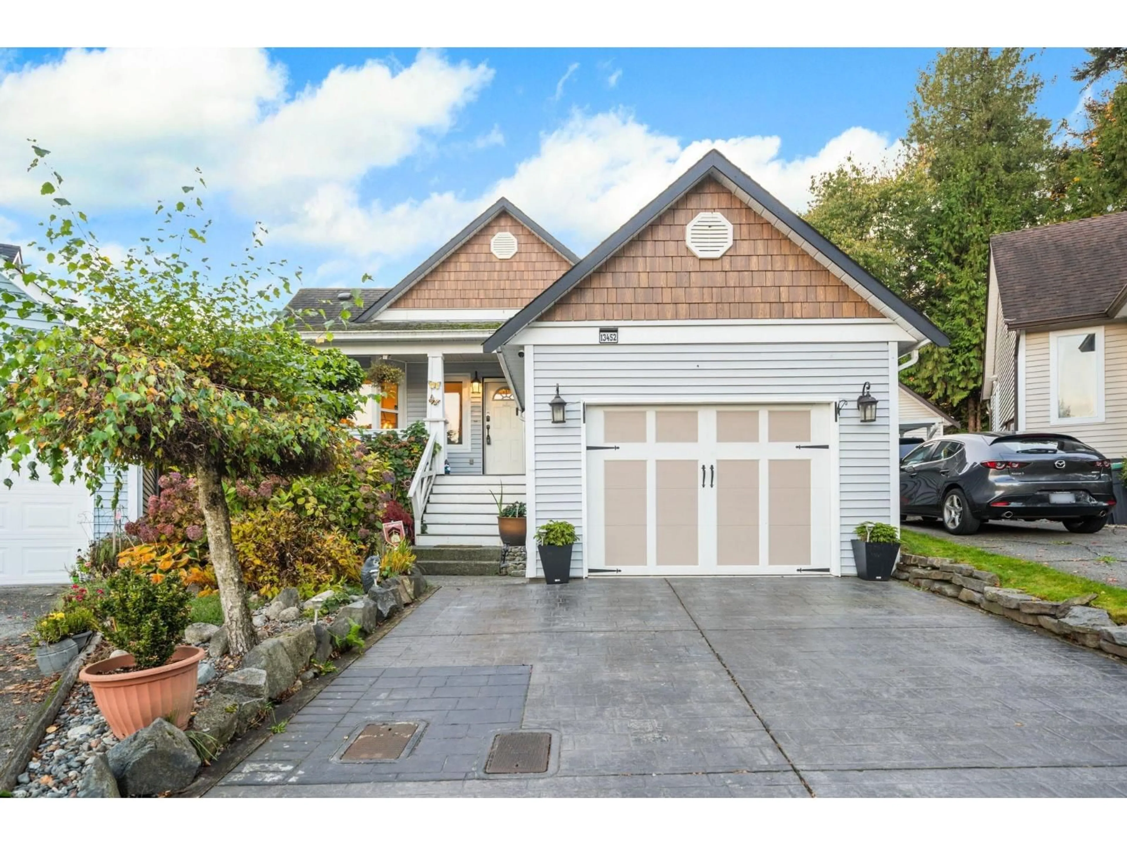 Home with vinyl exterior material, street for 13452 62A, Surrey British Columbia V3X1K4
