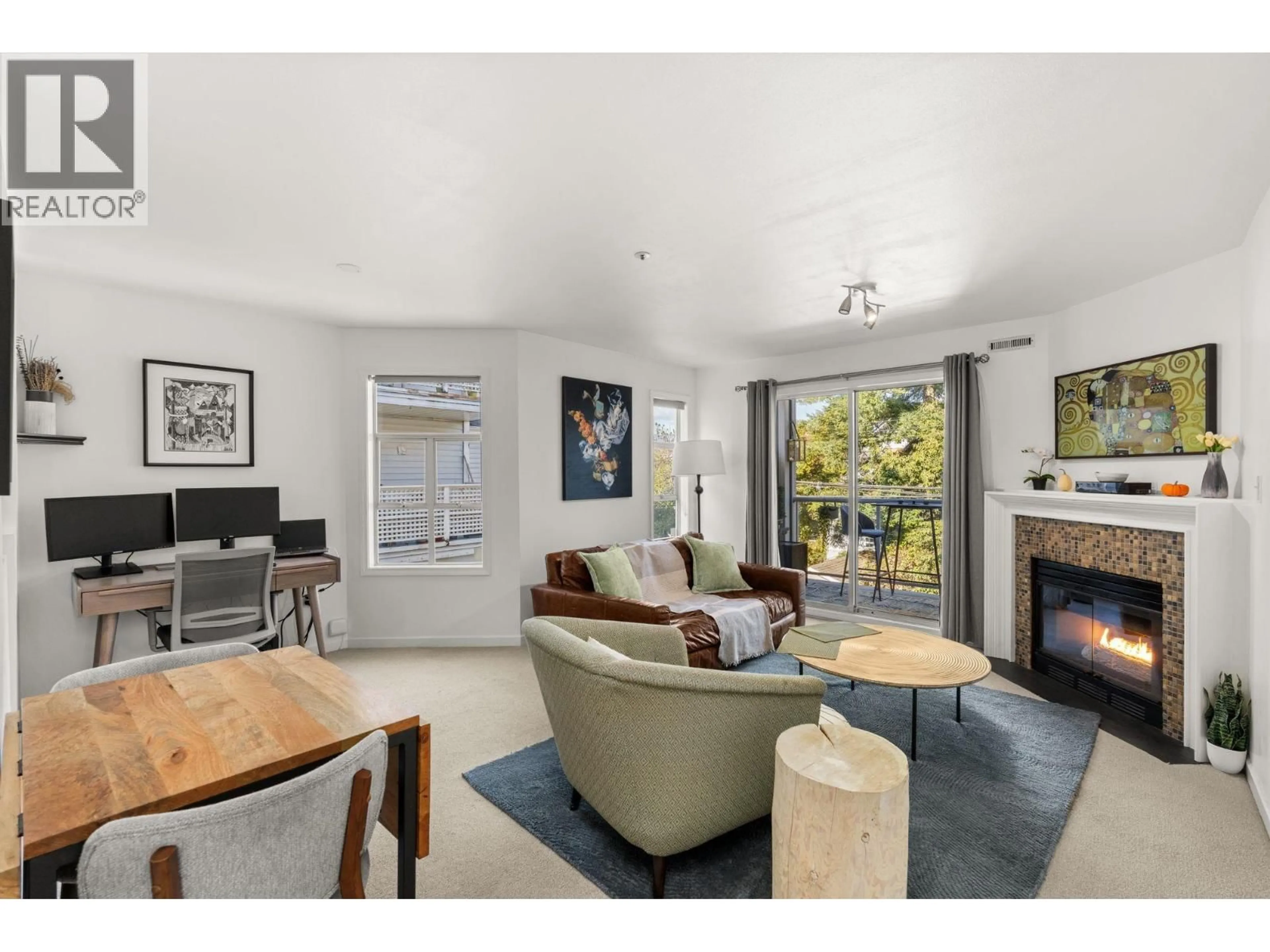 Living room with furniture, unknown for 202 - 1537 CHARLES STREET, Vancouver British Columbia V5L2T2