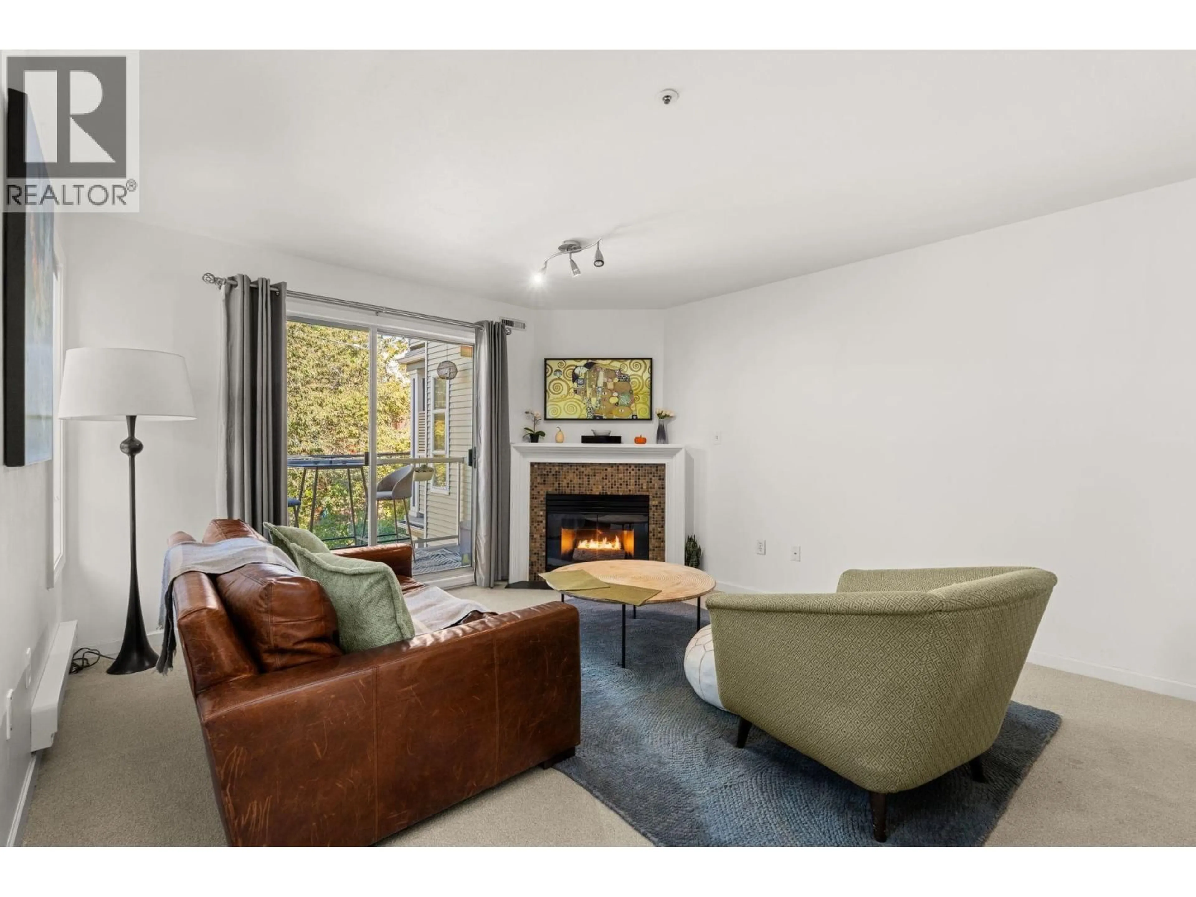 Living room with furniture, unknown for 202 - 1537 CHARLES STREET, Vancouver British Columbia V5L2T2