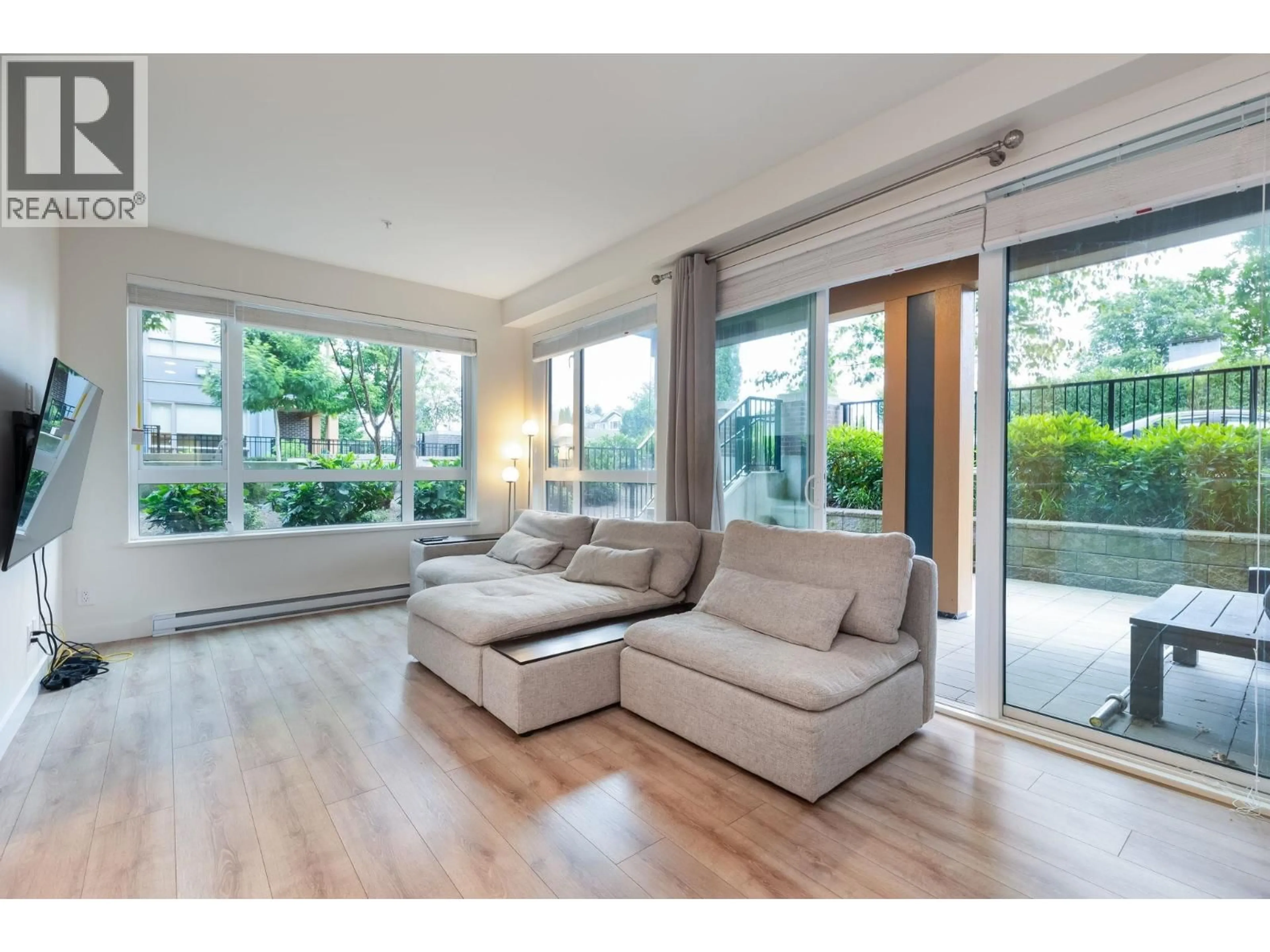 Living room with furniture, wood/laminate floor for 121 - 721 ANSKAR COURT, Coquitlam British Columbia V3J0L4