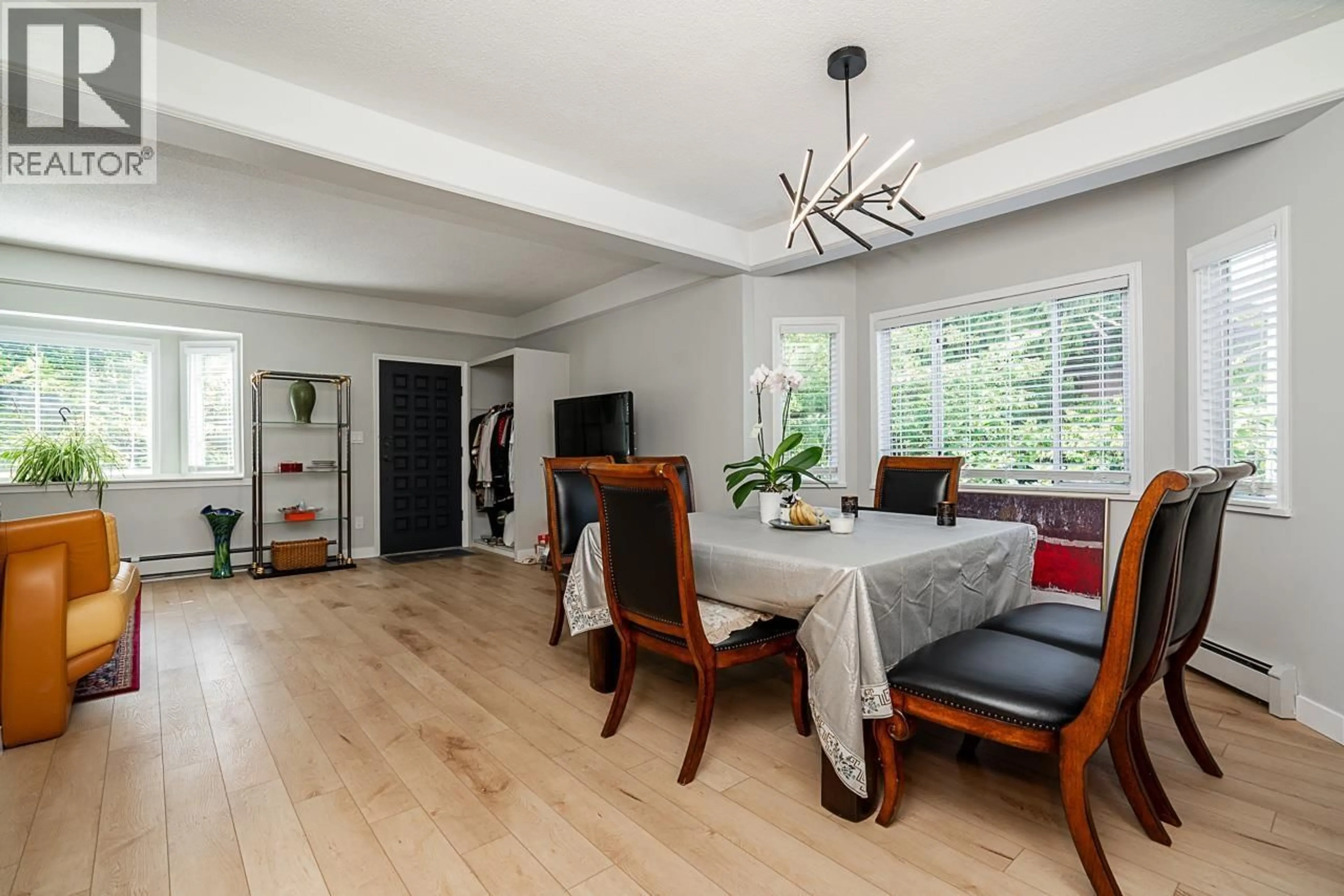 Dining room, wood/laminate floor for 3099 6TH AVENUE, Vancouver British Columbia V6K1X4