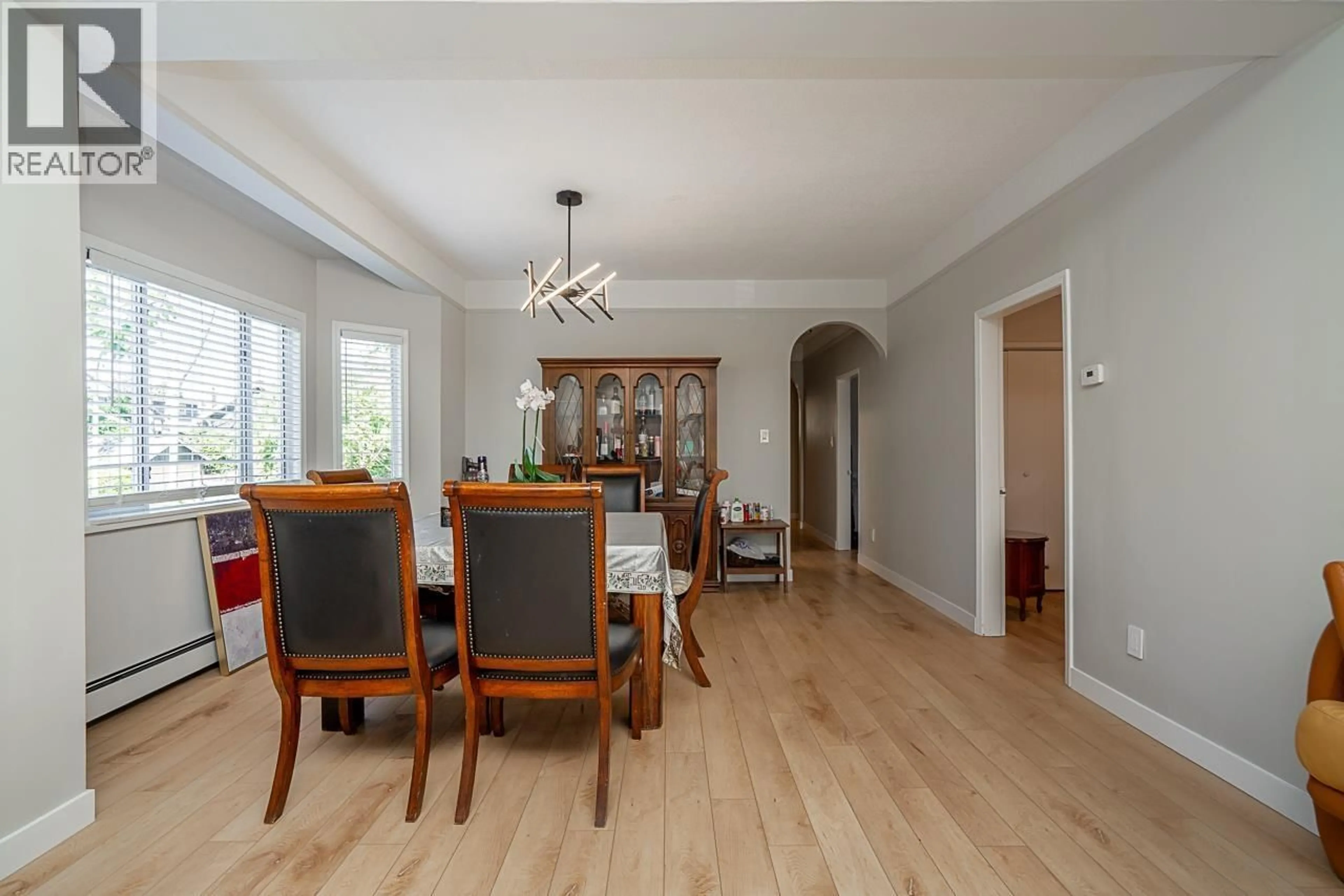 Dining room, wood/laminate floor for 3099 6TH AVENUE, Vancouver British Columbia V6K1X4