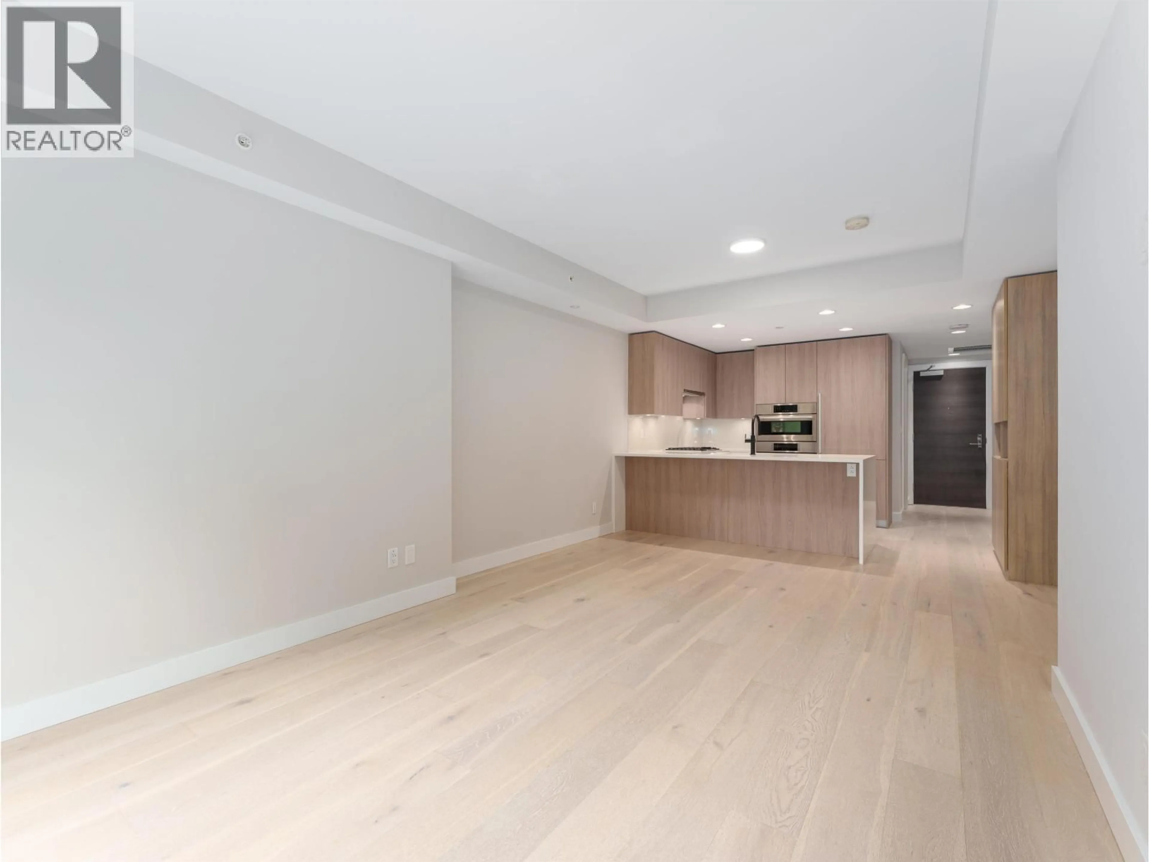 Open concept kitchen, unknown for 101 - 2738 LIBRARY LANE, North Vancouver British Columbia V7J0B3