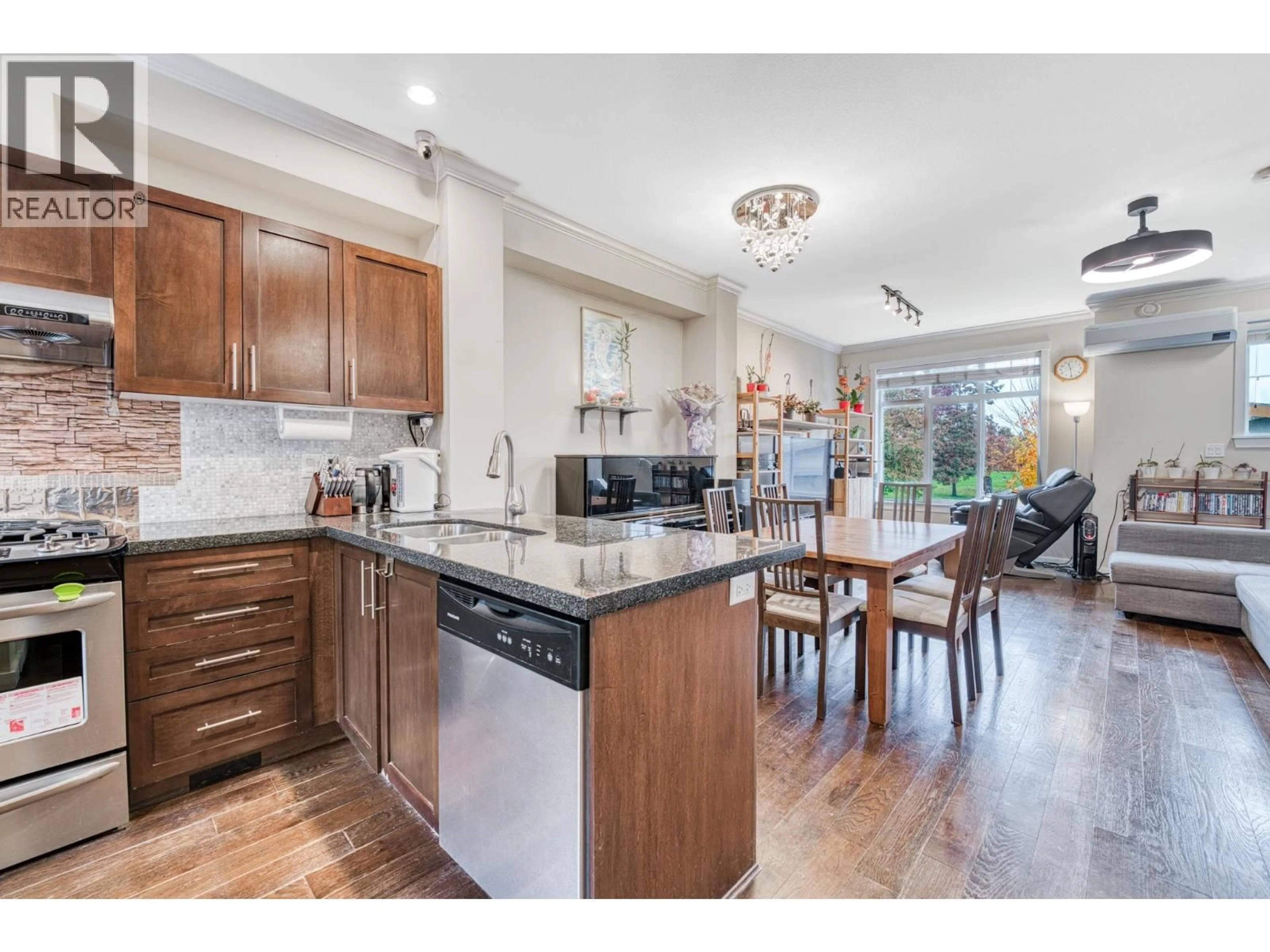 Open concept kitchen, ceramic/tile floor for 4 - 9580 ALBERTA ROAD, Richmond British Columbia V6Y1T6