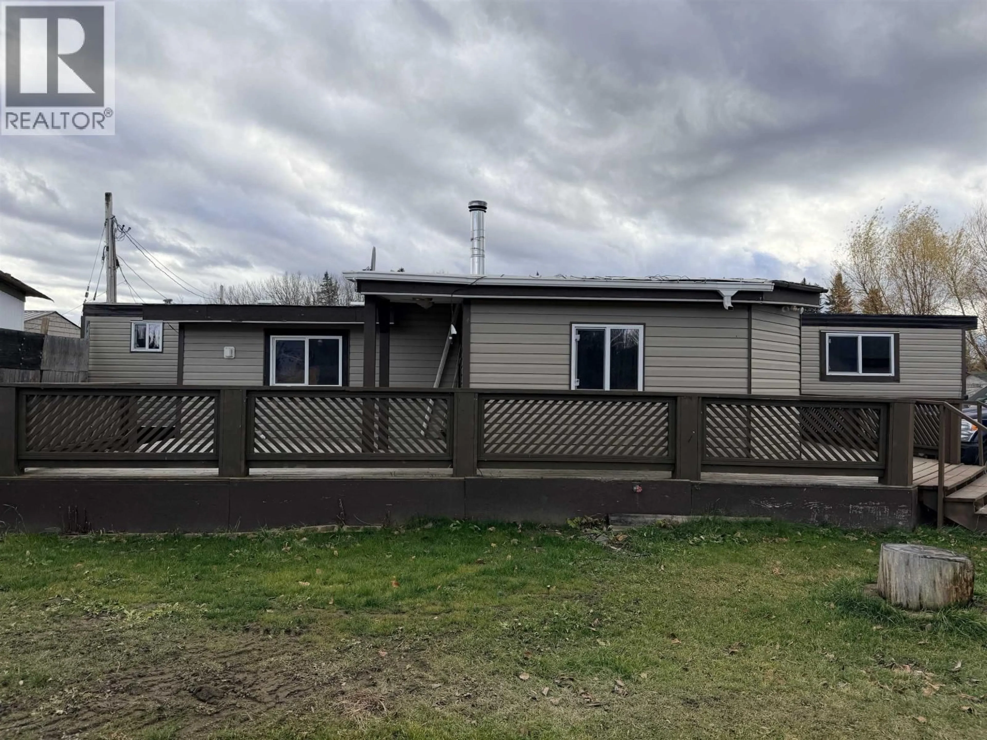 A pic from outside/outdoor area/front of a property/back of a property/a pic from drone, building for 8 - 862 BC SPRUCE ROAD, Fort St. James British Columbia V0J1P0