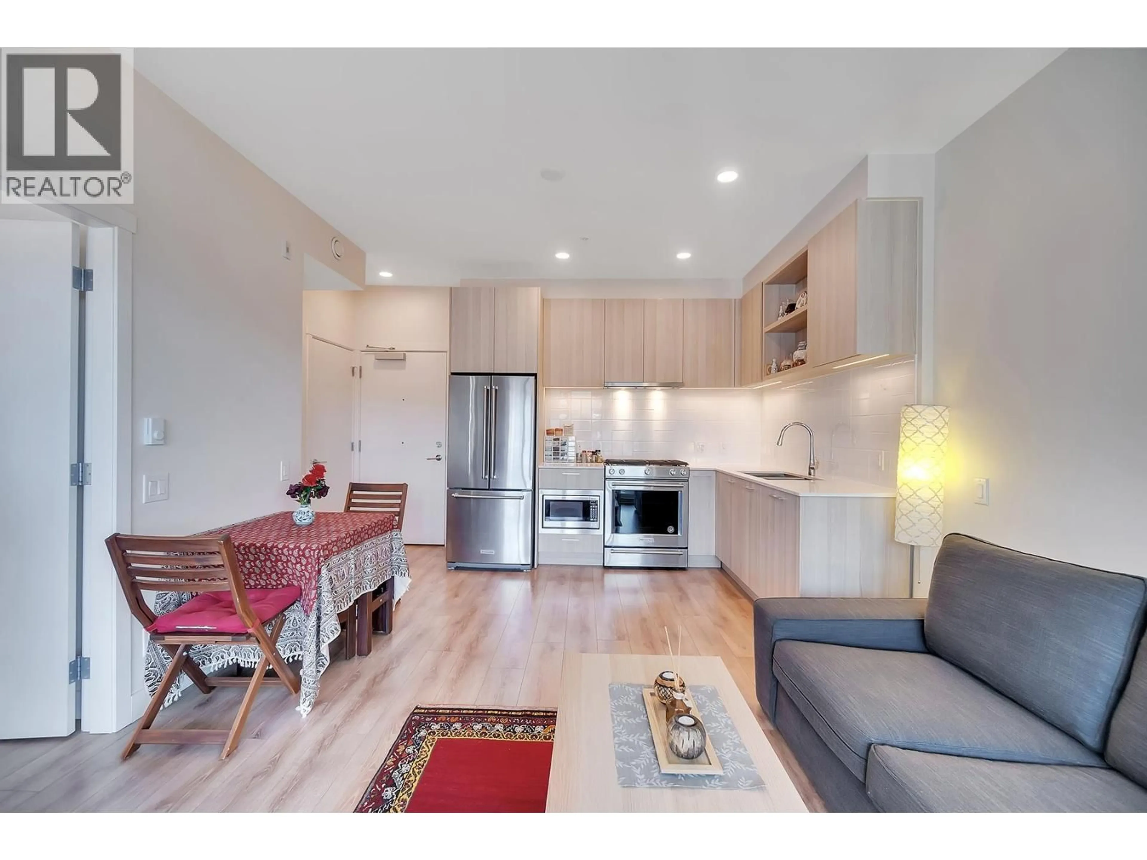 Open concept kitchen, wood/laminate floor for 620 - 721 ANSKAR COURT, Coquitlam British Columbia V3J0L4