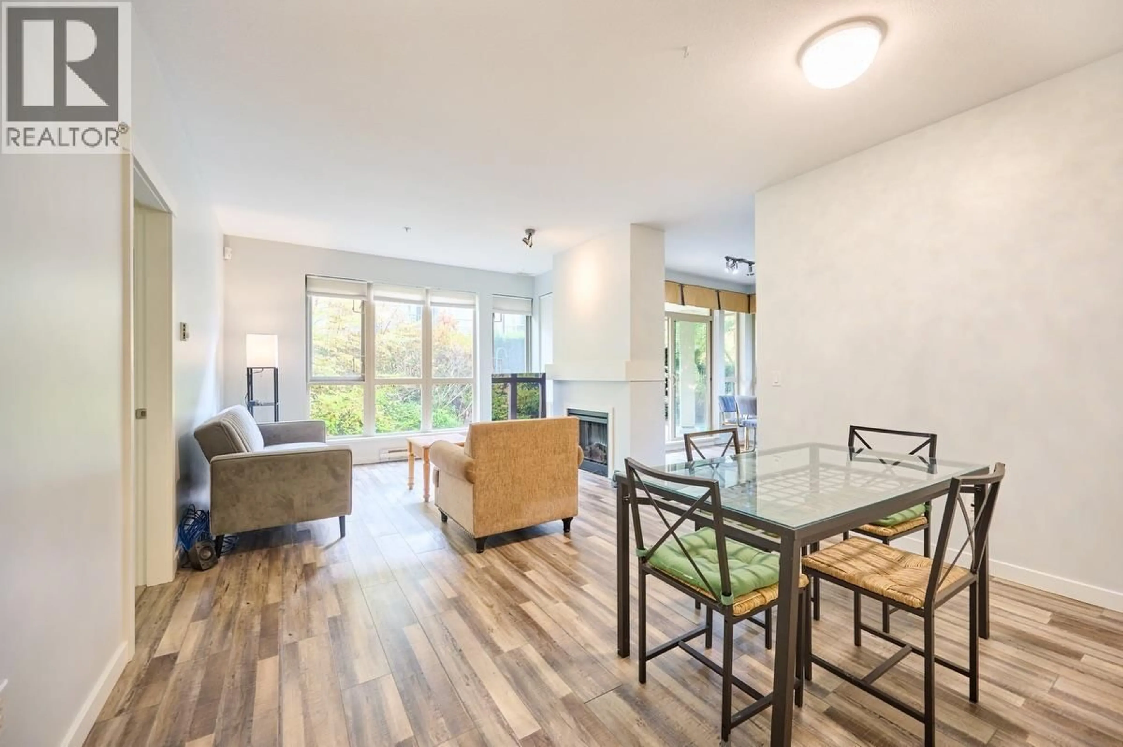 Living room with furniture, wood/laminate floor for 119 - 801 KLAHANIE DRIVE, Port Moody British Columbia V3H5K4