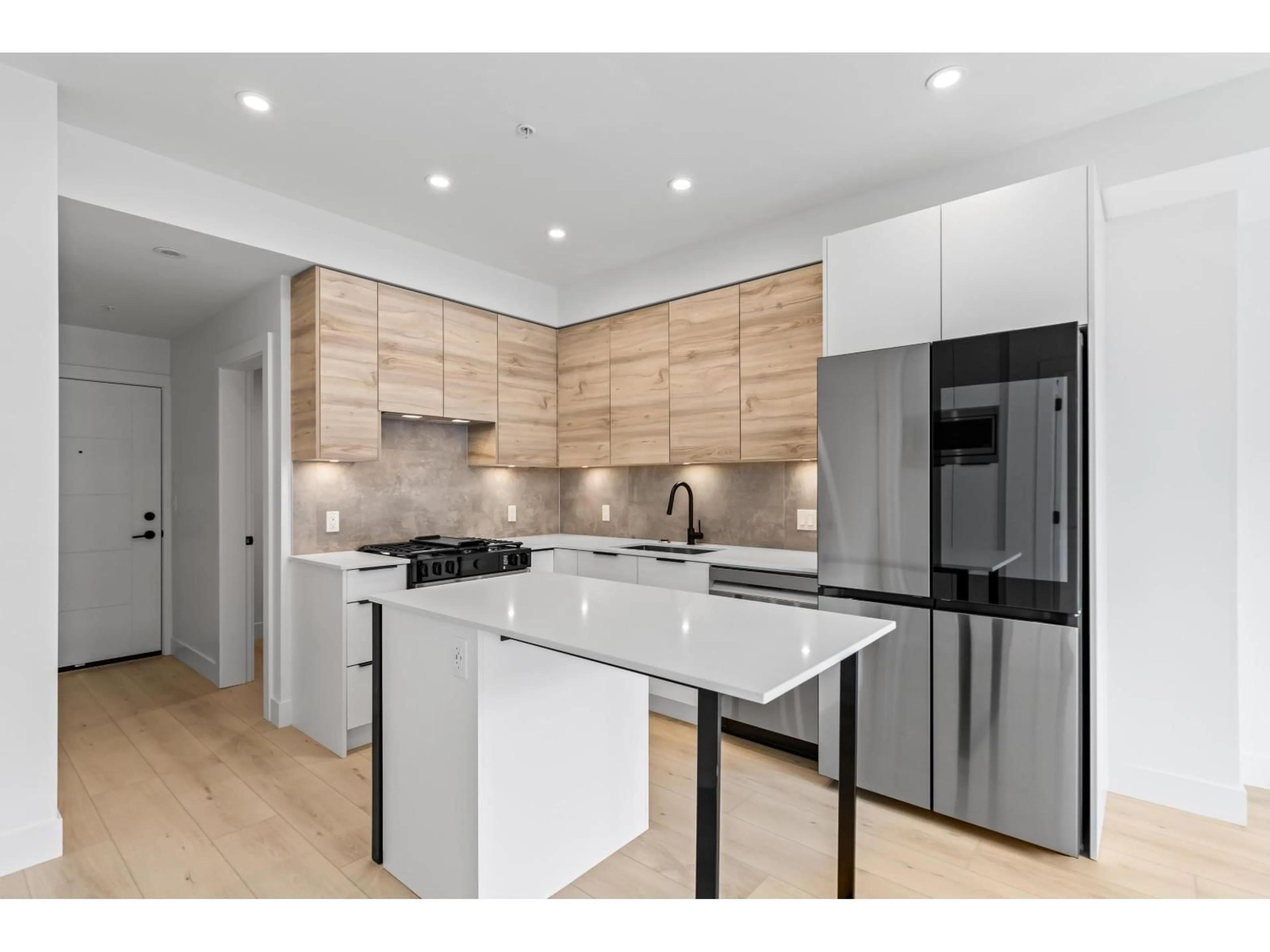 Open concept kitchen, unknown for 106 - 30494 CARDINAL, Abbotsford British Columbia V2T0M1