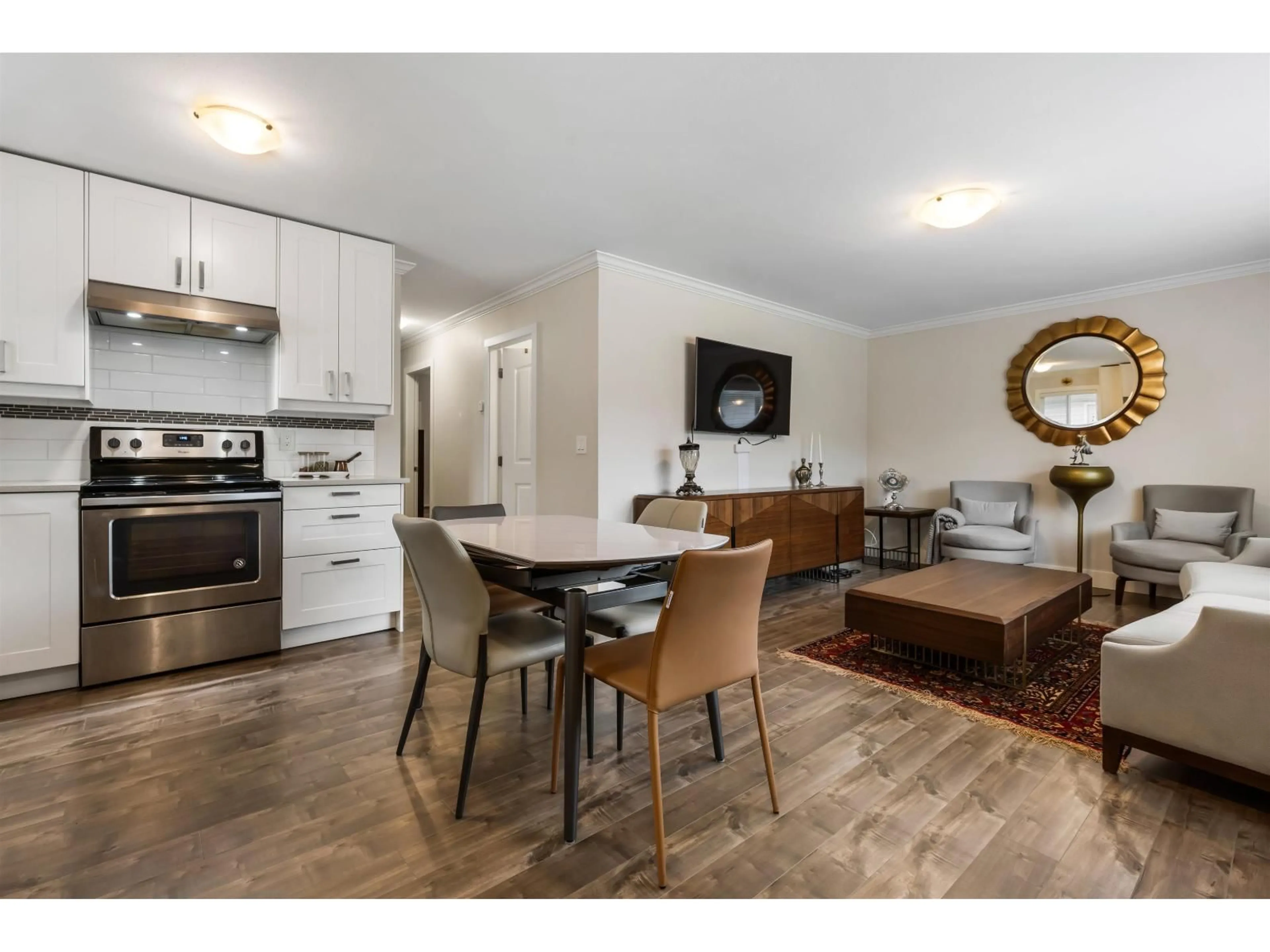 Open concept kitchen, wood/laminate floor for 3 - 5648 VEDDER ROAD, Sardis British Columbia V2R3M8