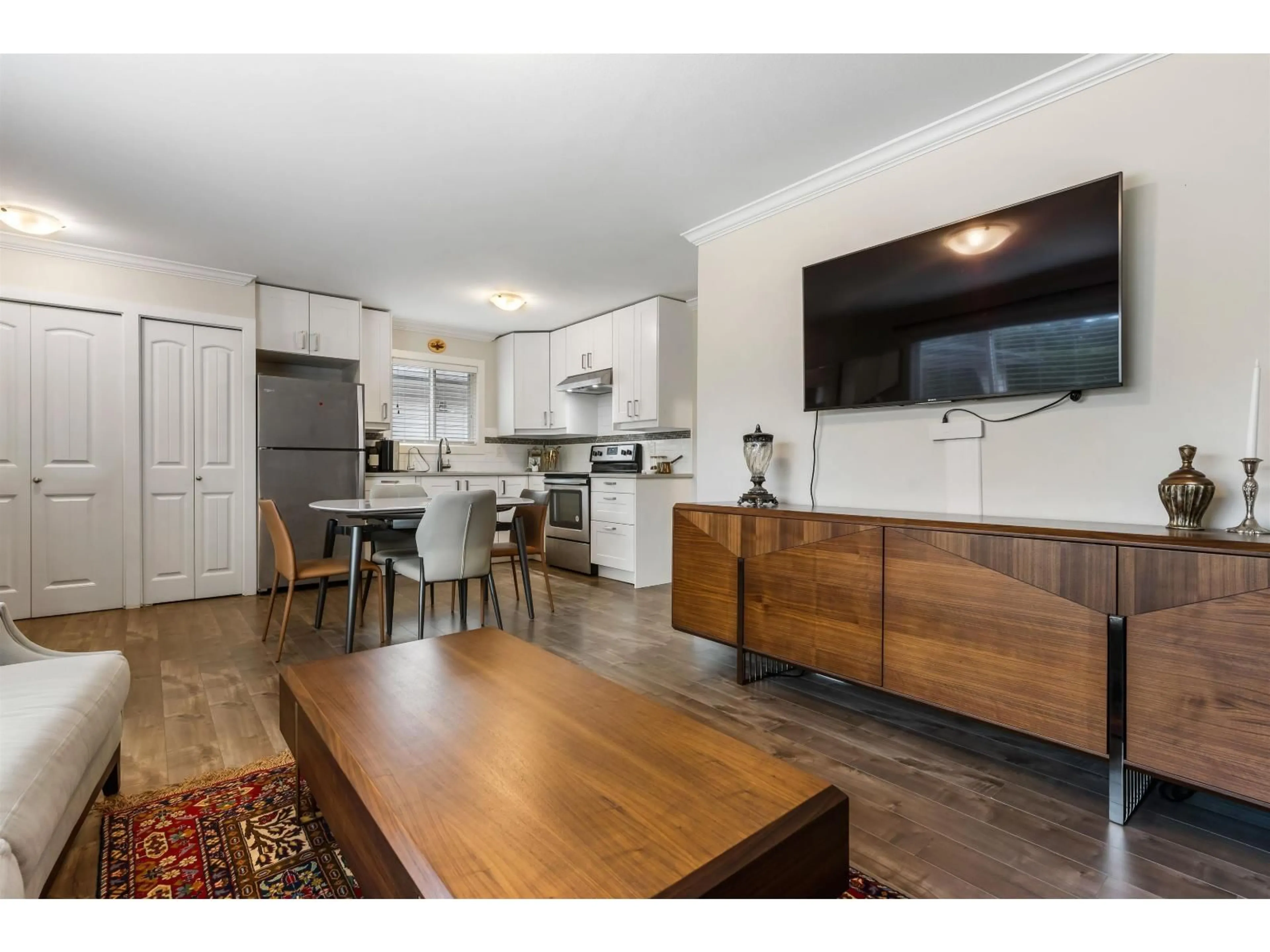 Open concept kitchen, wood/laminate floor for 3 - 5648 VEDDER ROAD, Sardis British Columbia V2R3M8