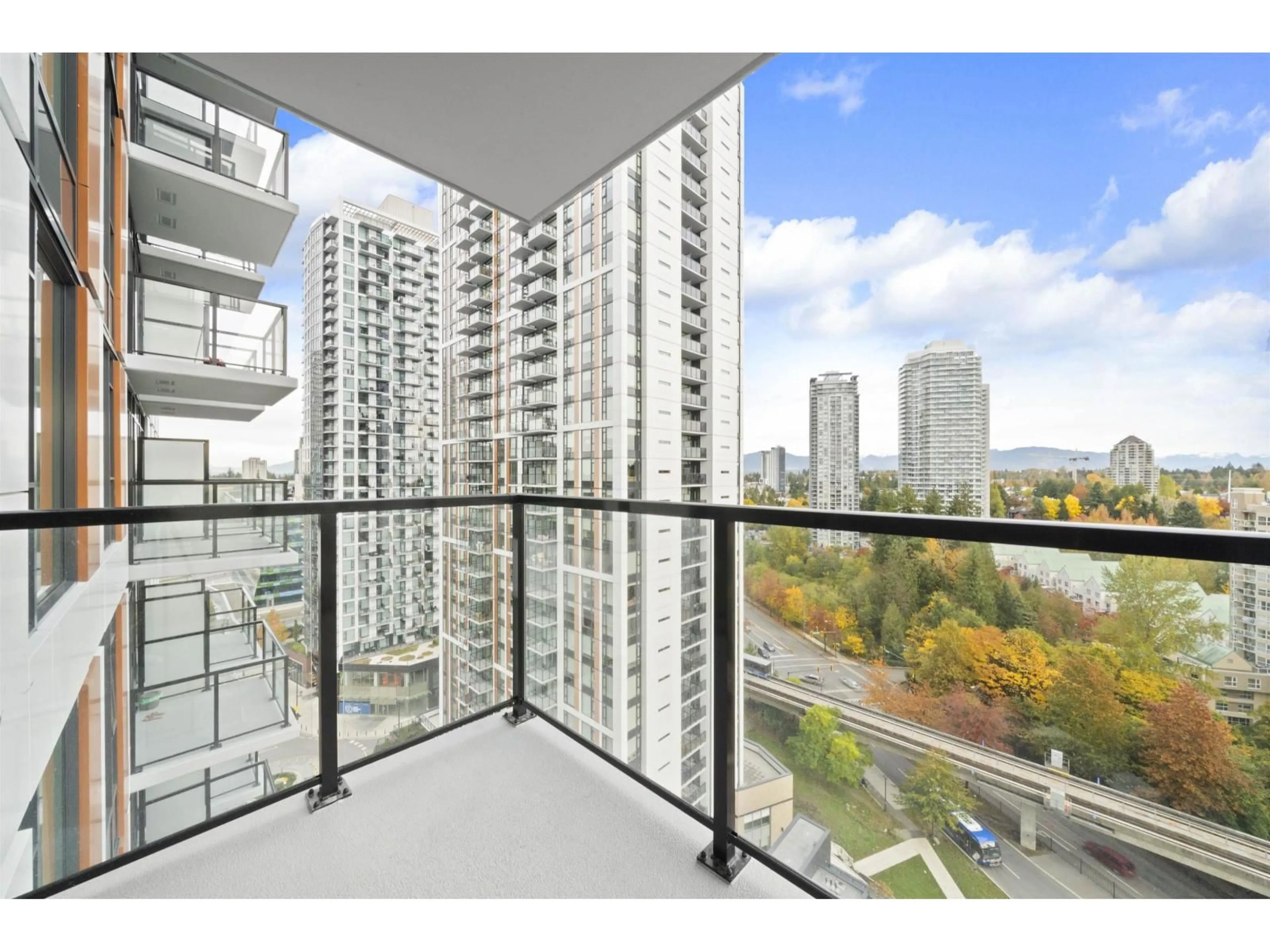 Balcony in the apartment, city buildings view from balcony for 1407 - 13745 GEORGE JUNCTION, Surrey British Columbia V3T4Y3