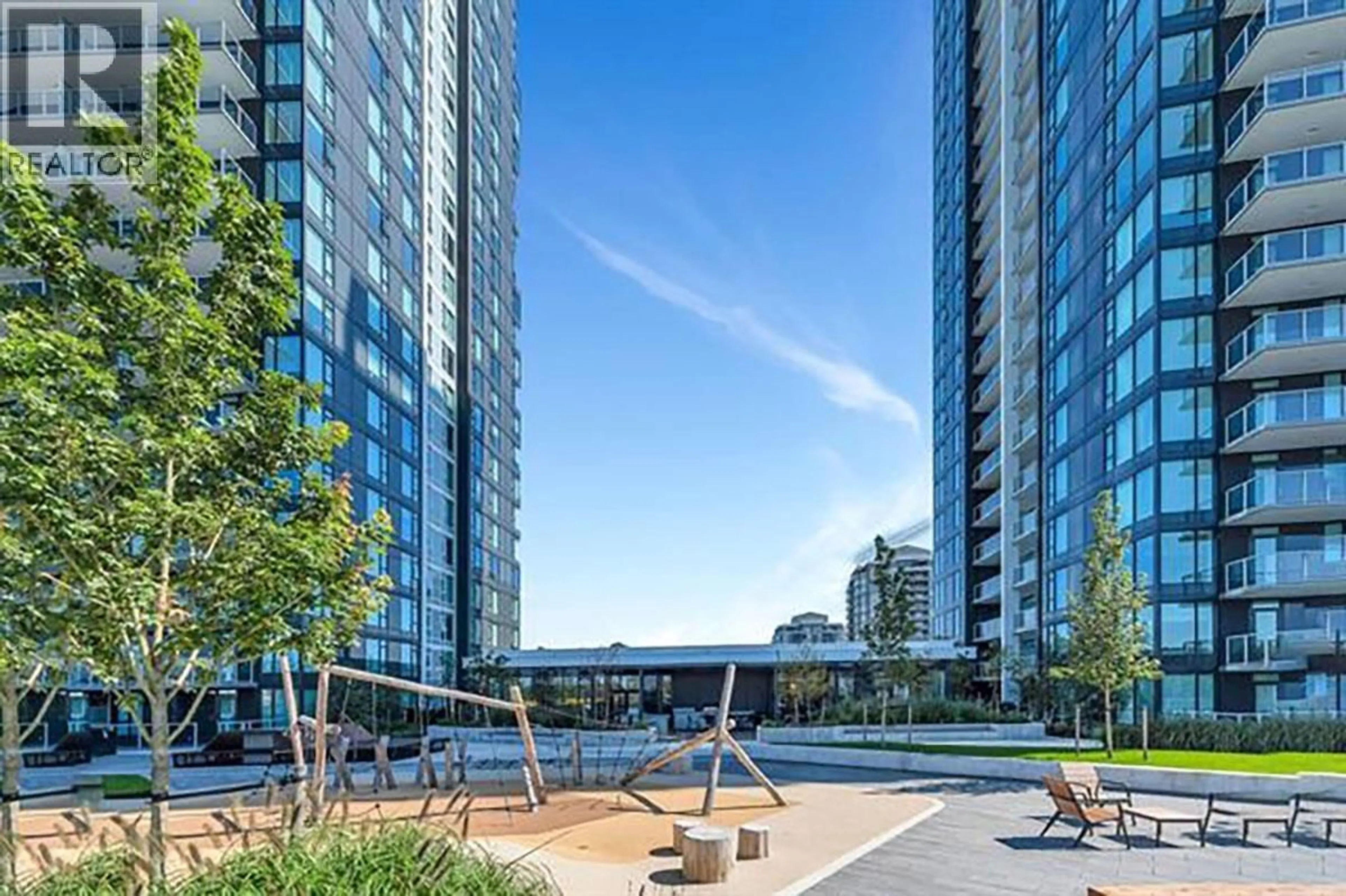Patio, city buildings view from balcony for 1009 - 308 ALDERSON AVENUE, Coquitlam British Columbia V3K0J2