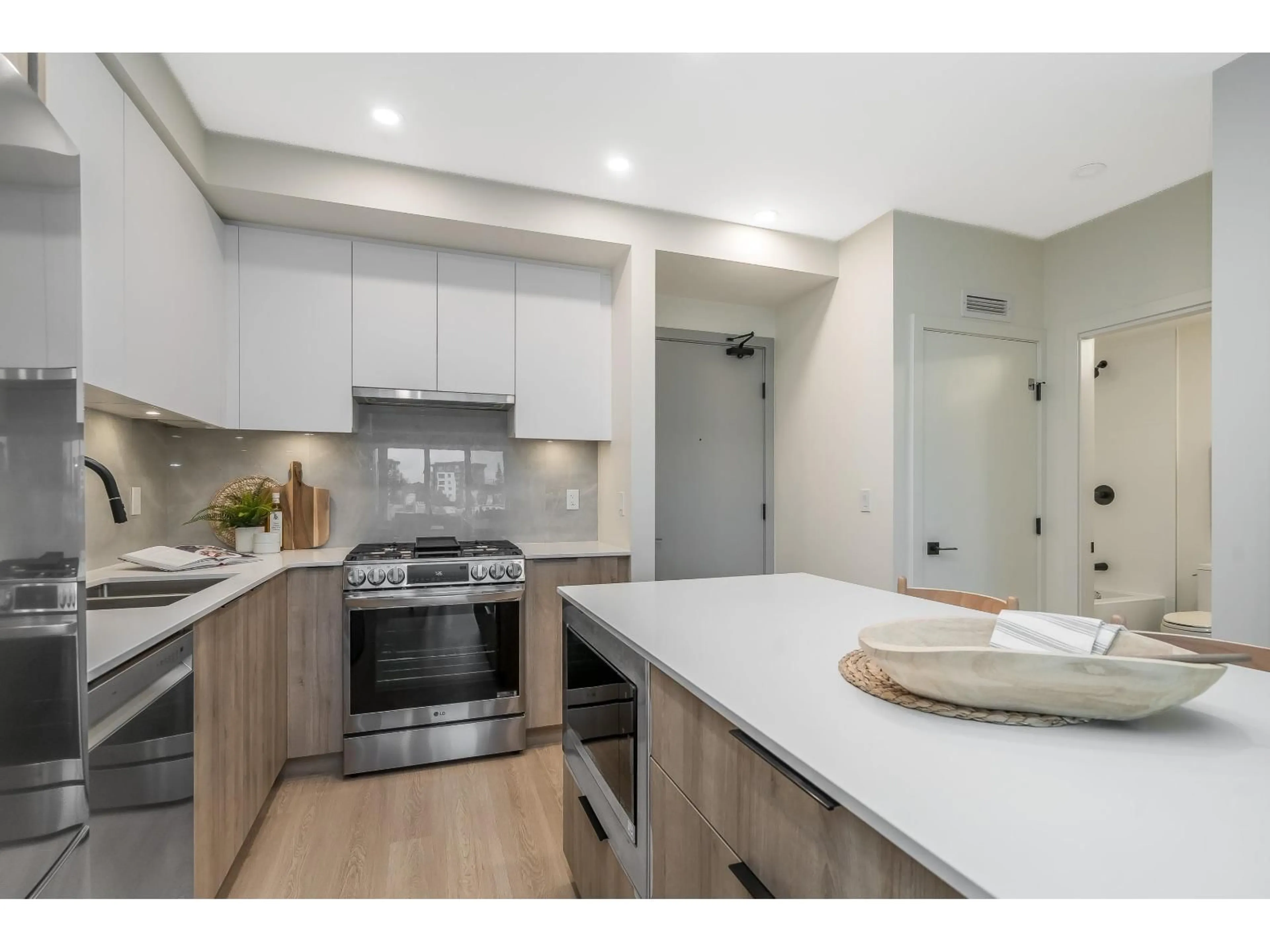 Open concept kitchen, unknown for A411 - 7980 206A, Langley British Columbia V2Y3Z8