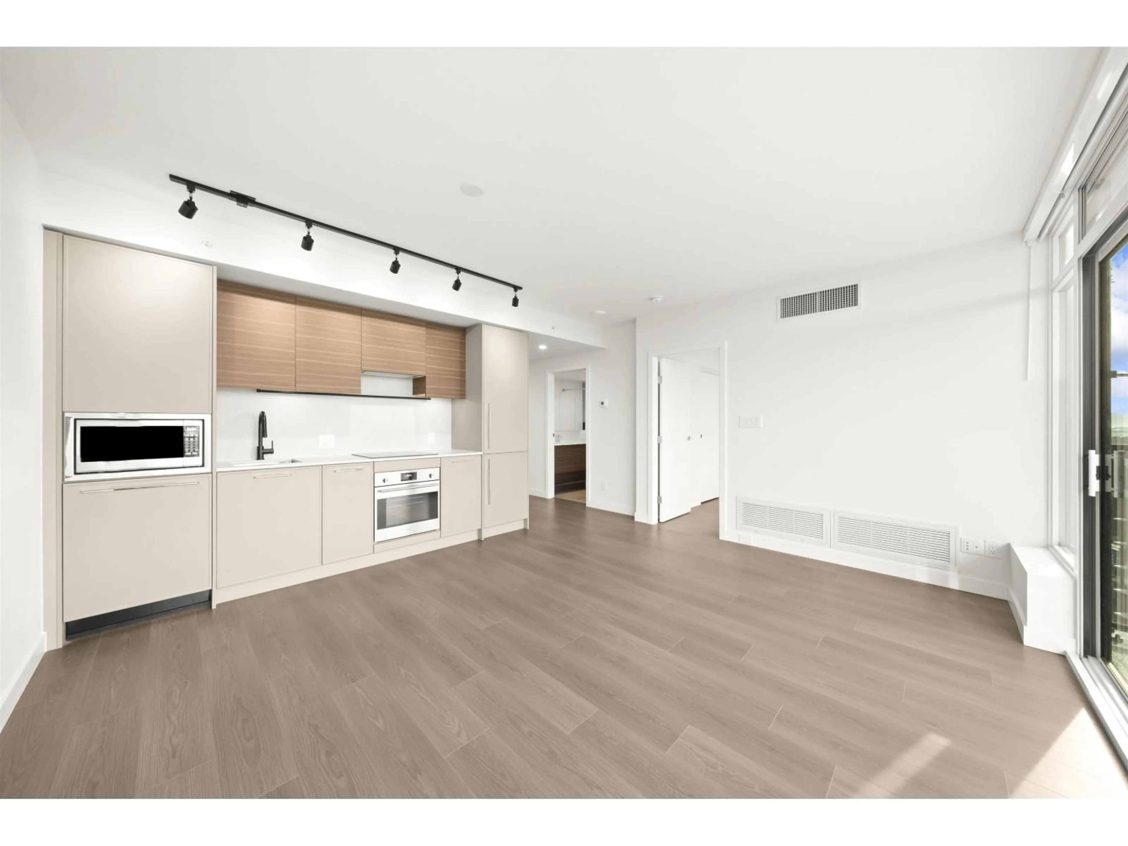 Open concept kitchen, wood/laminate floor for 4208 - 13745 GEORGE JUNCTION, Surrey British Columbia V3T4Y3