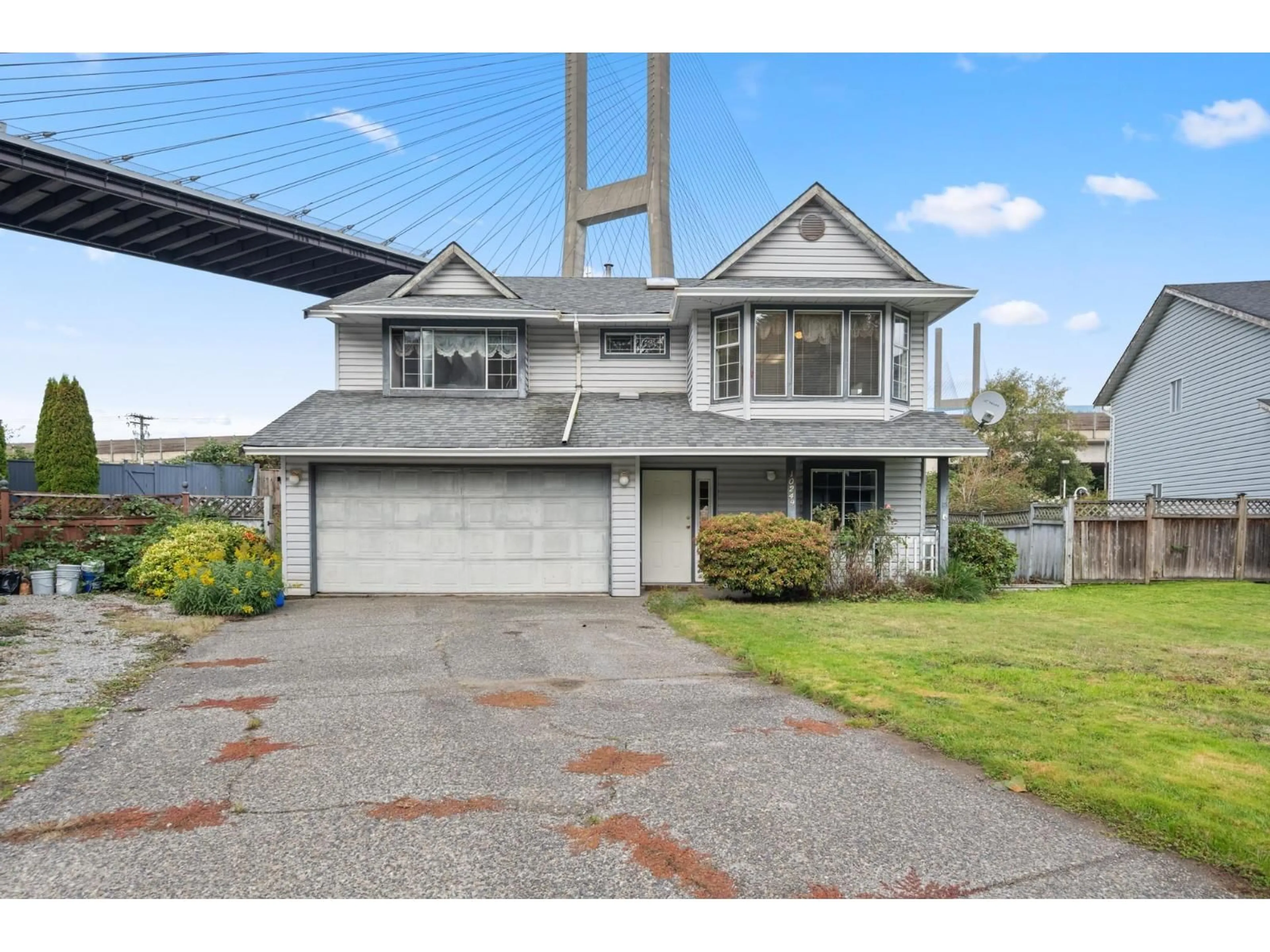 Home with vinyl exterior material, street for 10249 SHEAVES, Delta British Columbia V4C8C9