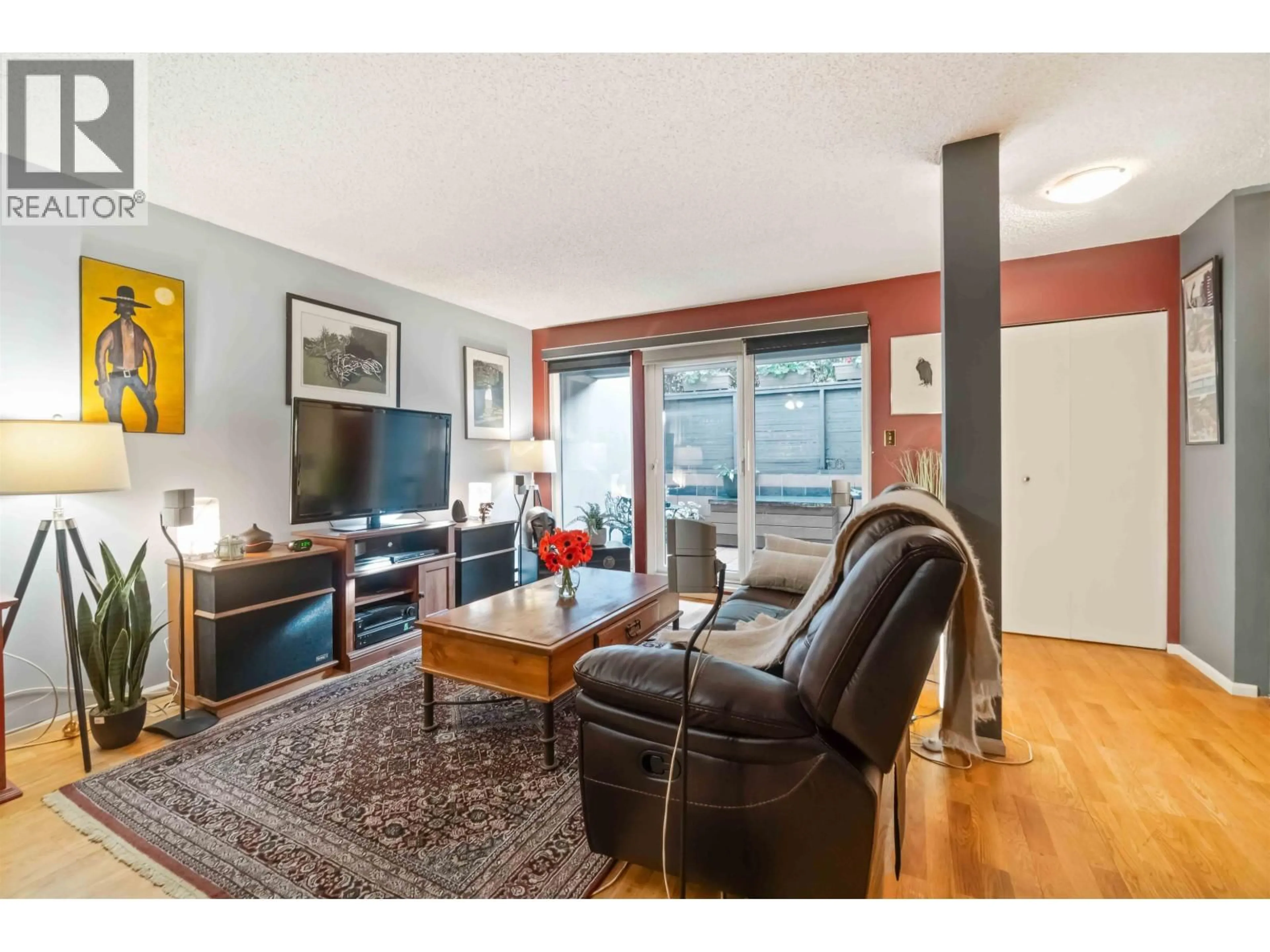 Living room with furniture, wood/laminate floor for 1305 8TH AVENUE, Vancouver British Columbia V6H3W4