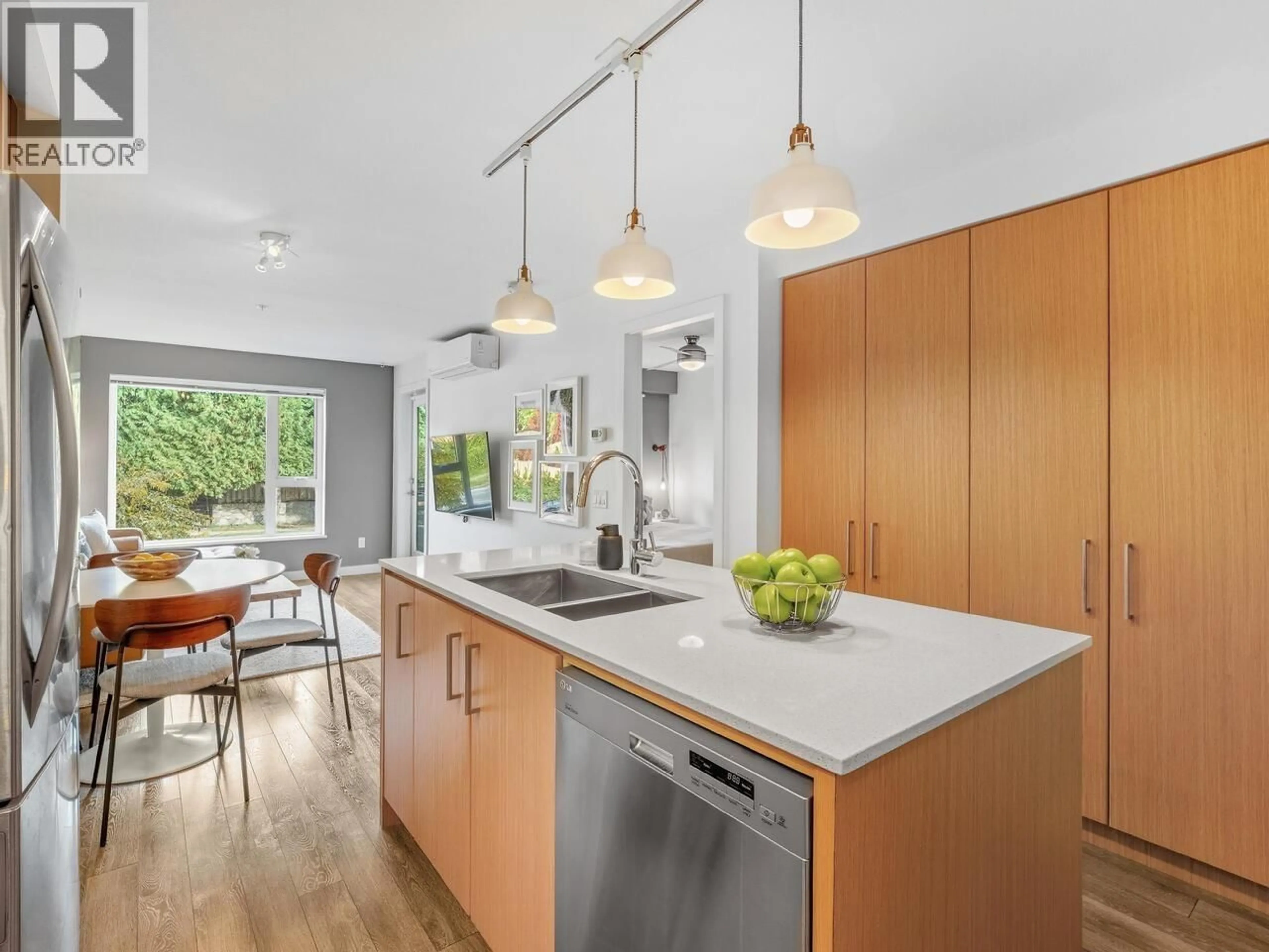 Open concept kitchen, unknown for 208 - 221 3RD STREET, North Vancouver British Columbia V7L0C1