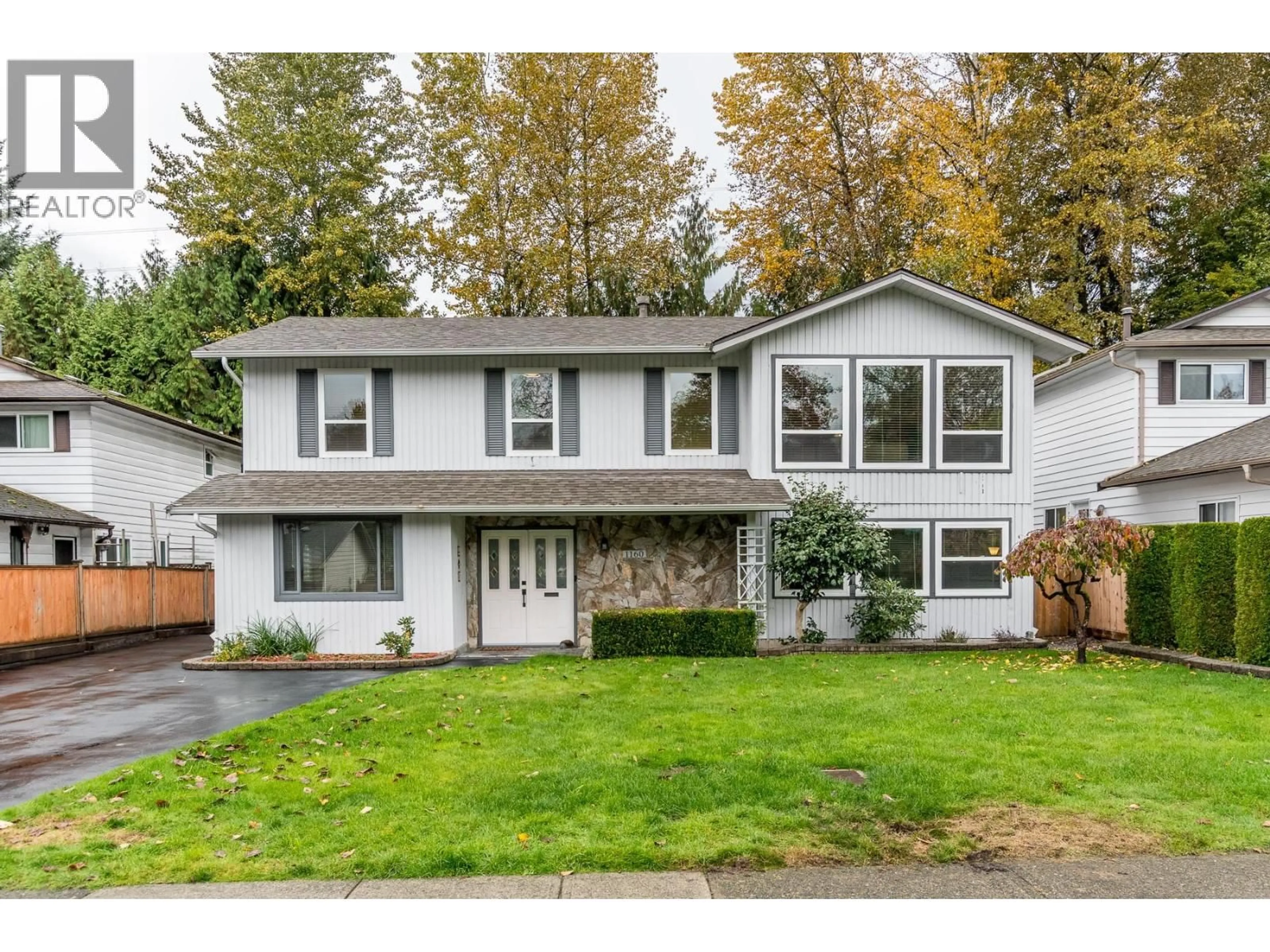 Home with vinyl exterior material, street for 1160 EAGLERIDGE DRIVE, Coquitlam British Columbia V3E1C2