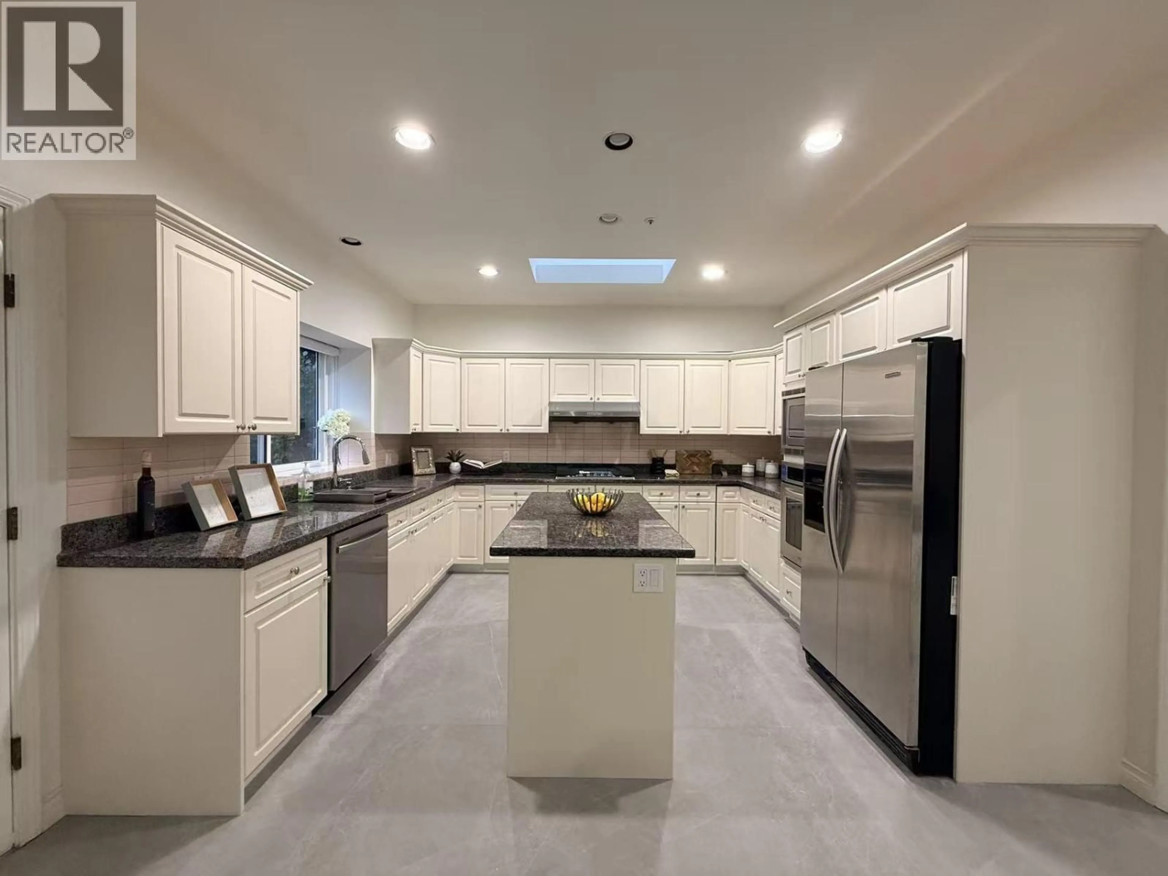 Contemporary kitchen, ceramic/tile floor for 3565 29TH AVENUE, Vancouver British Columbia V6S1T2