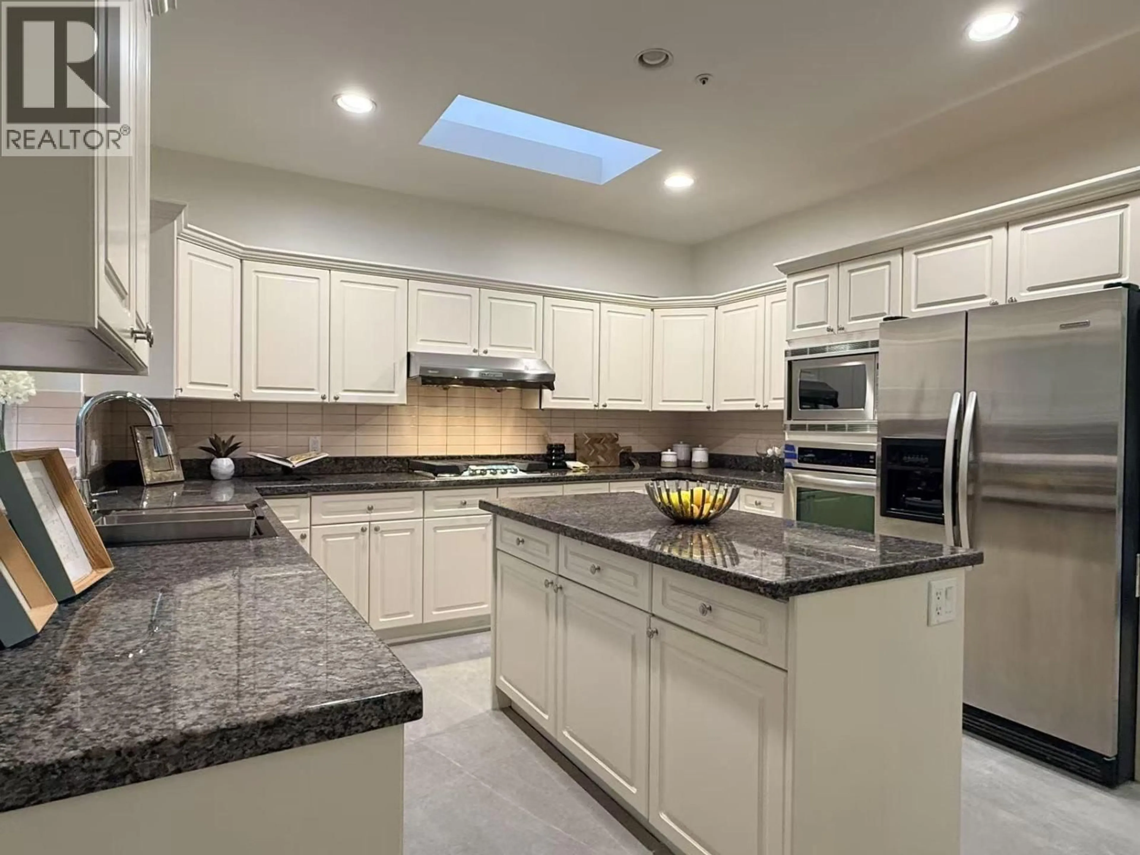 Contemporary kitchen, ceramic/tile floor for 3565 29TH AVENUE, Vancouver British Columbia V6S1T2