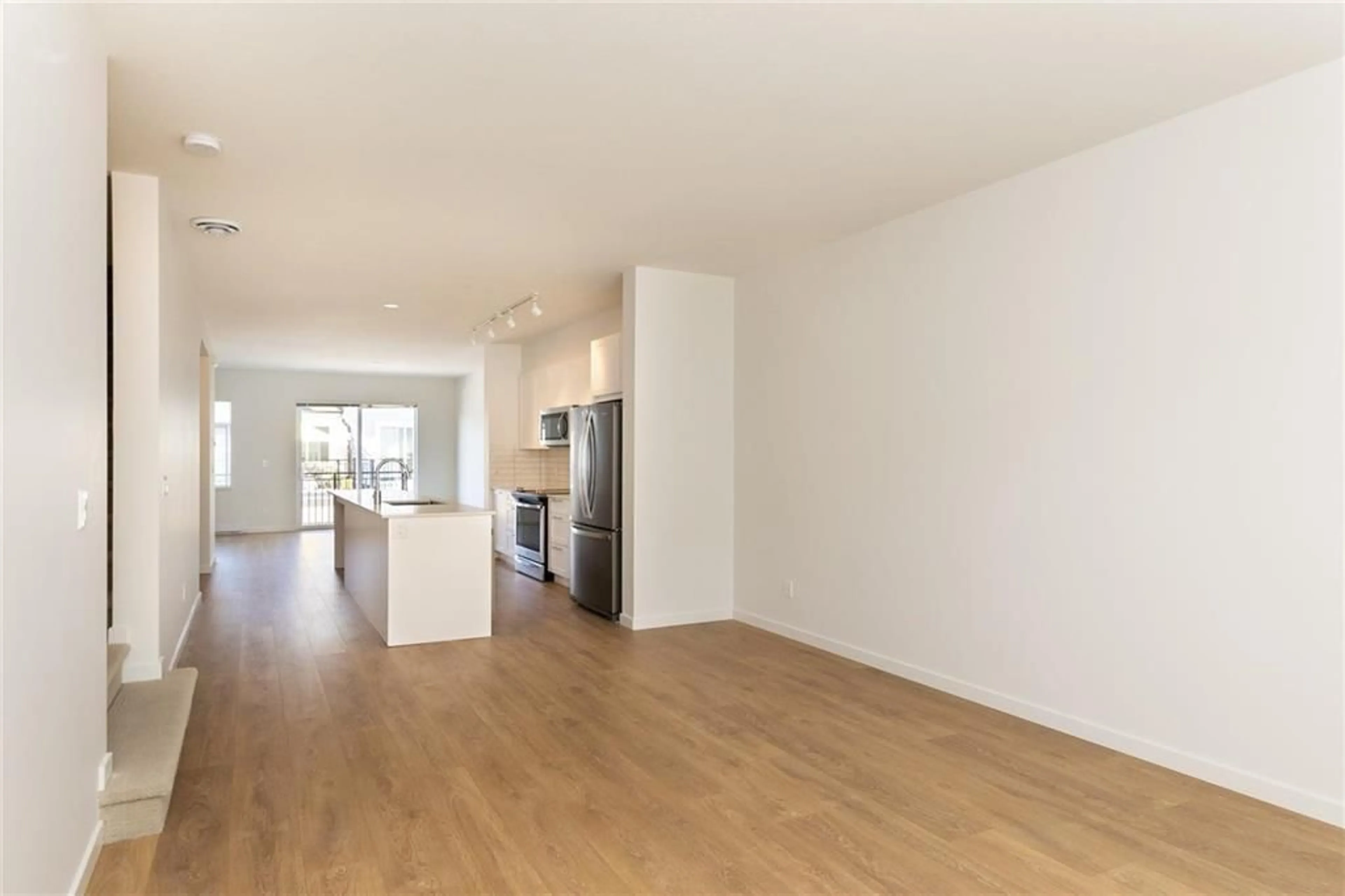 Open concept kitchen, wood/laminate floor for 603 - 18505 LAURENSEN, Surrey British Columbia V4N6R7