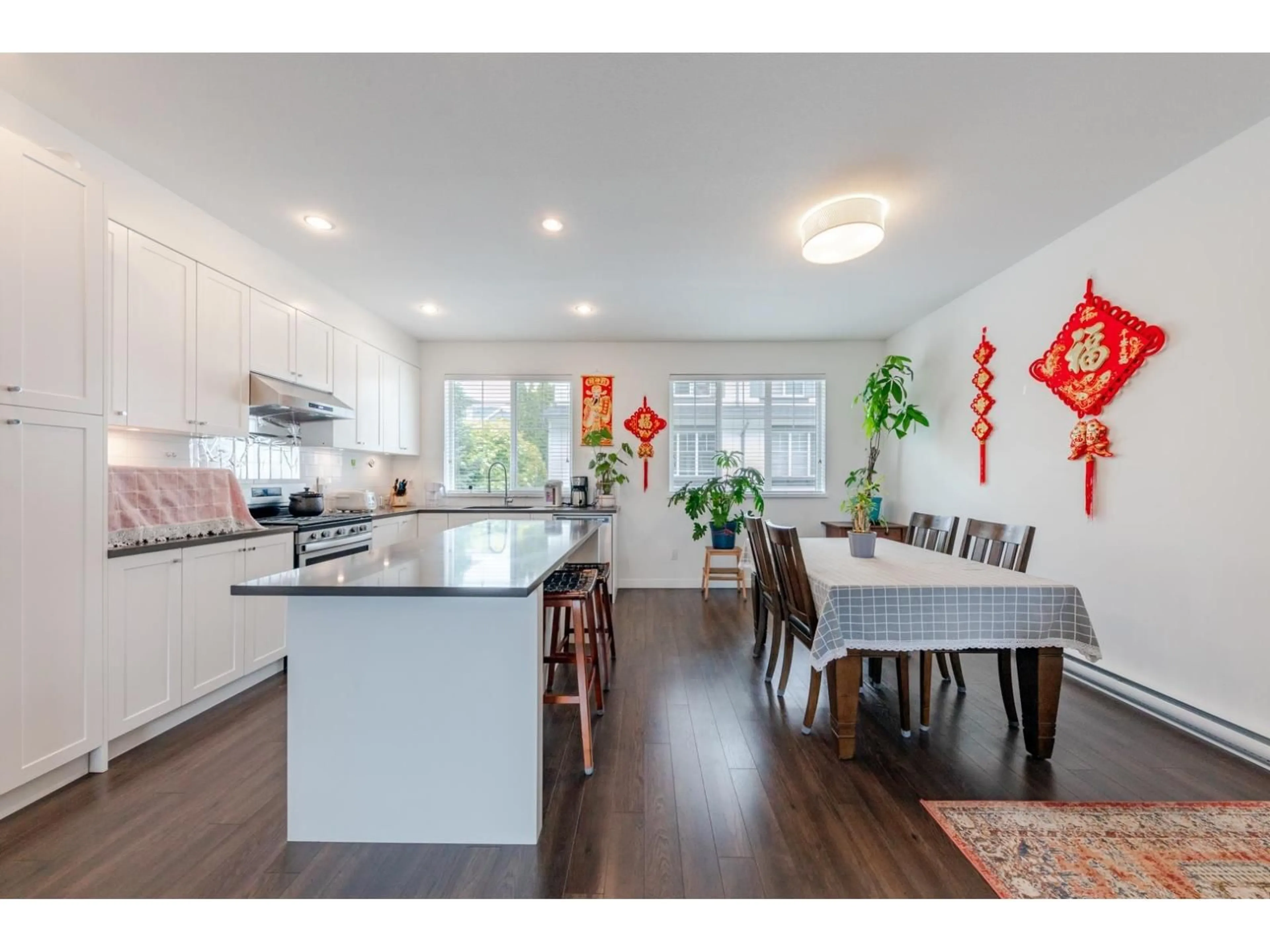 Open concept kitchen, wood/laminate floor for 28 - 16337 15, Surrey British Columbia V4A0C3