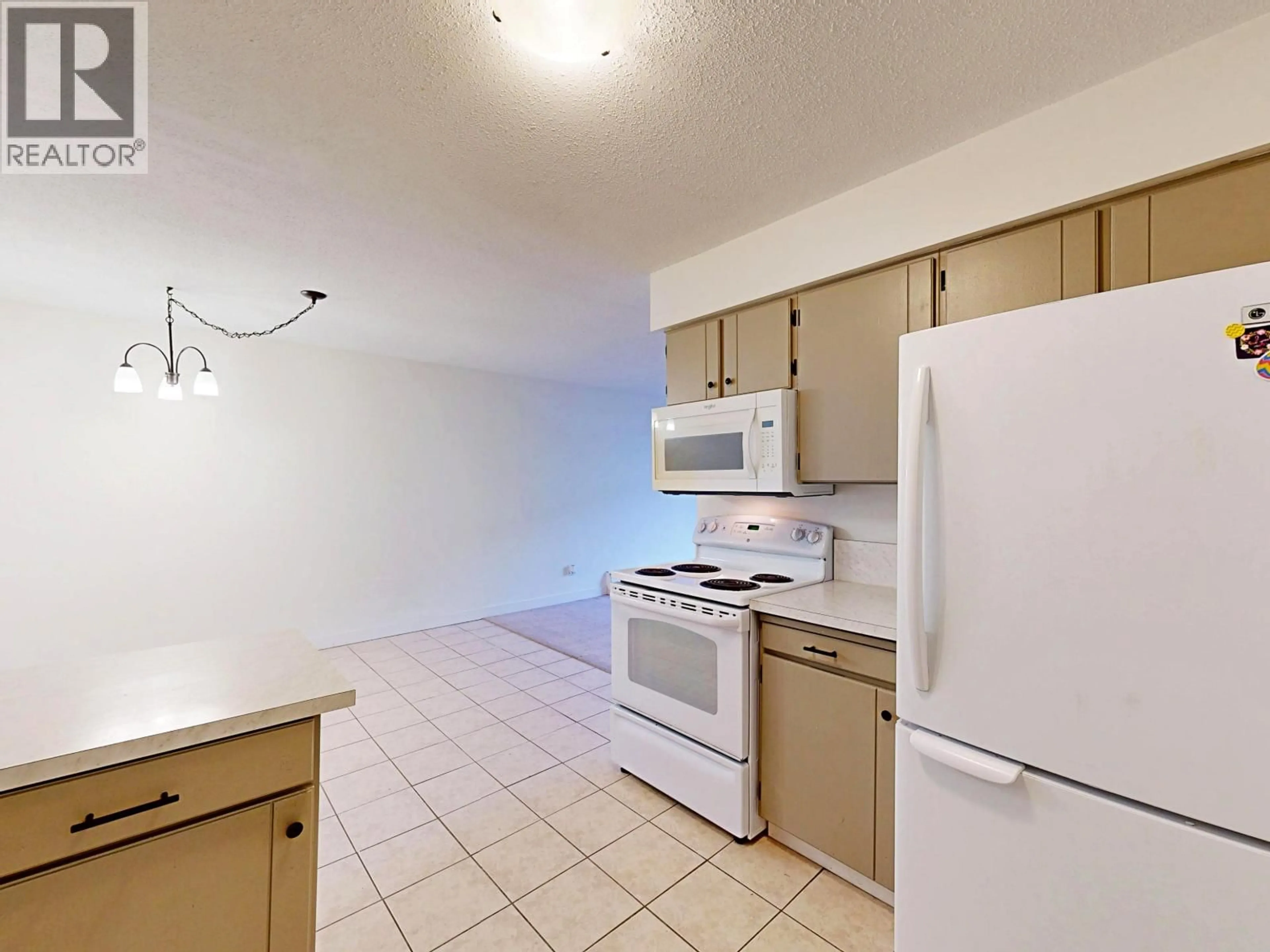 Standard kitchen, unknown for 206 - 138 18TH STREET, North Vancouver British Columbia V7M1W4