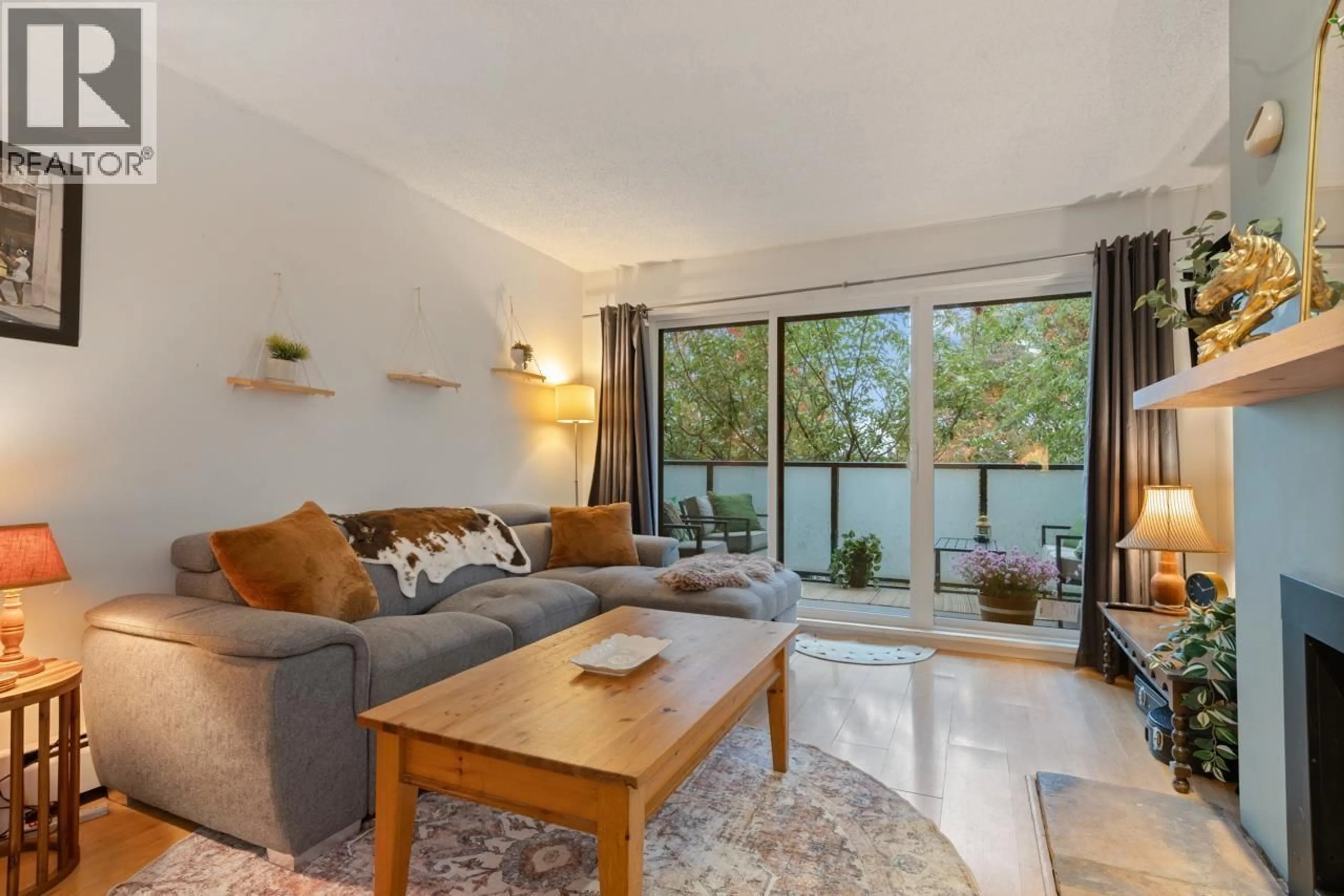 Living room with furniture, unknown for 208 - 1516 CHARLES STREET, Vancouver British Columbia V5L2T1