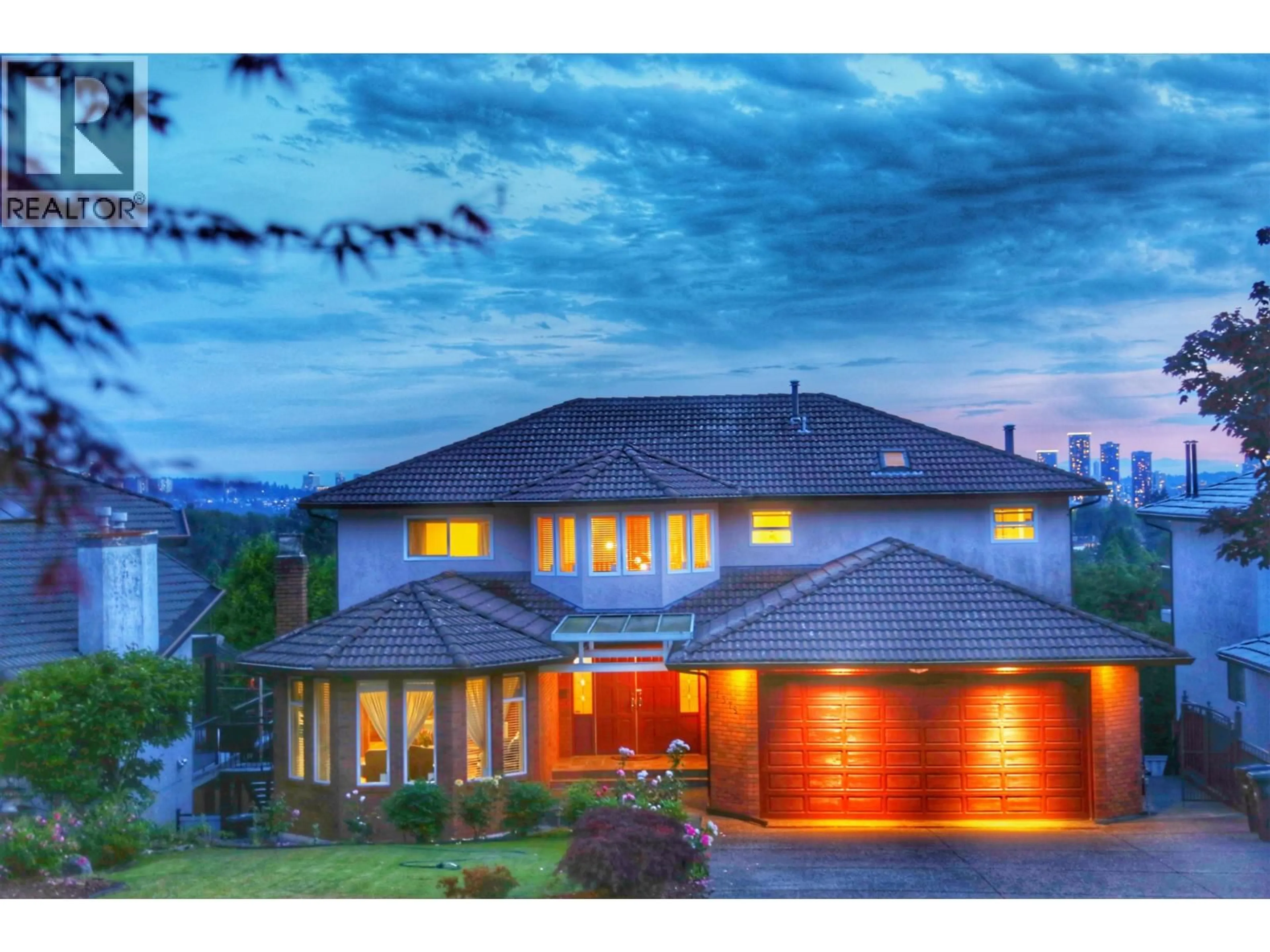 Home with brick exterior material, mountain view for 7378 UNION STREET, Burnaby British Columbia V5A1J2